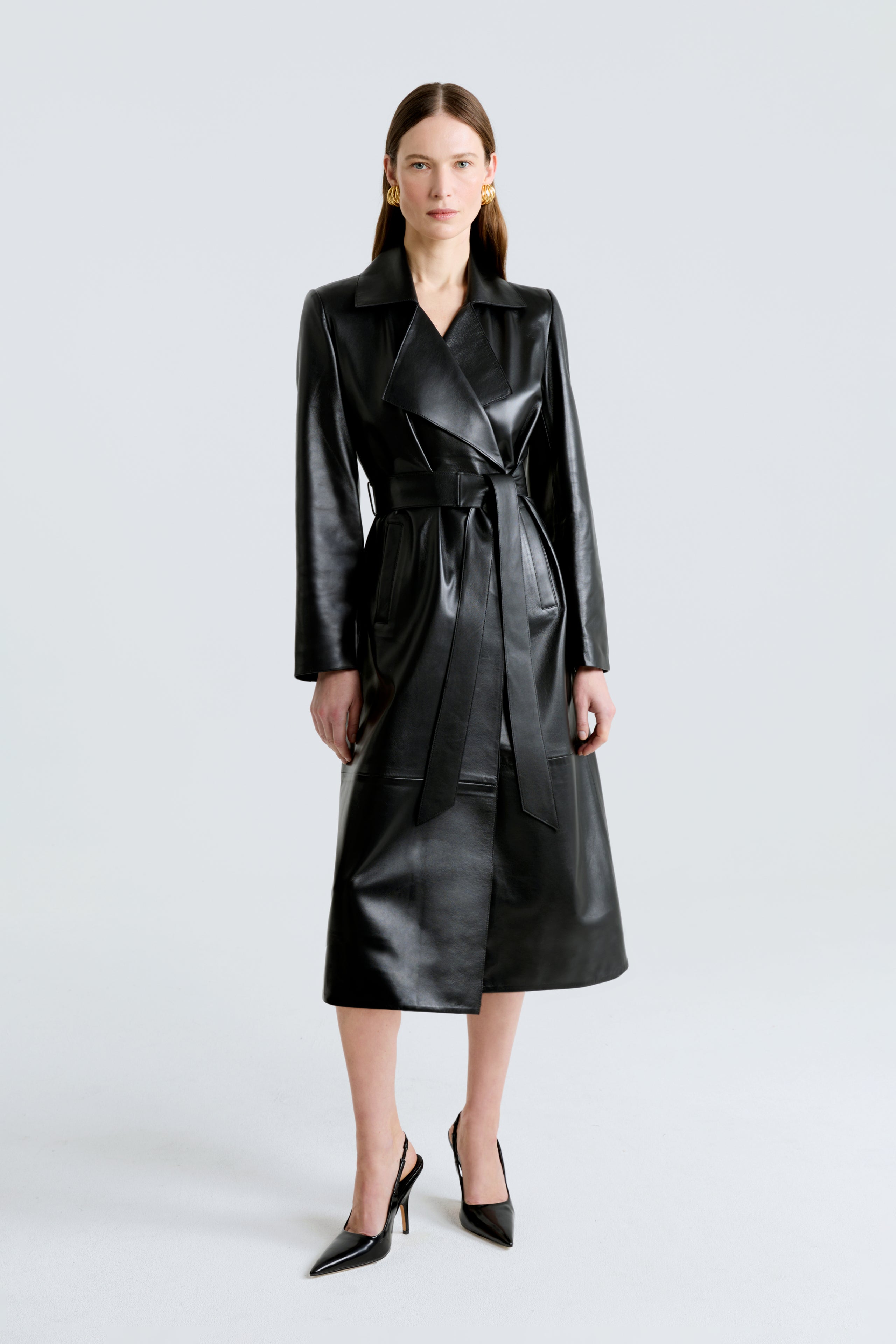 Model is wearing the Amina Black Belted Leather Coat Front