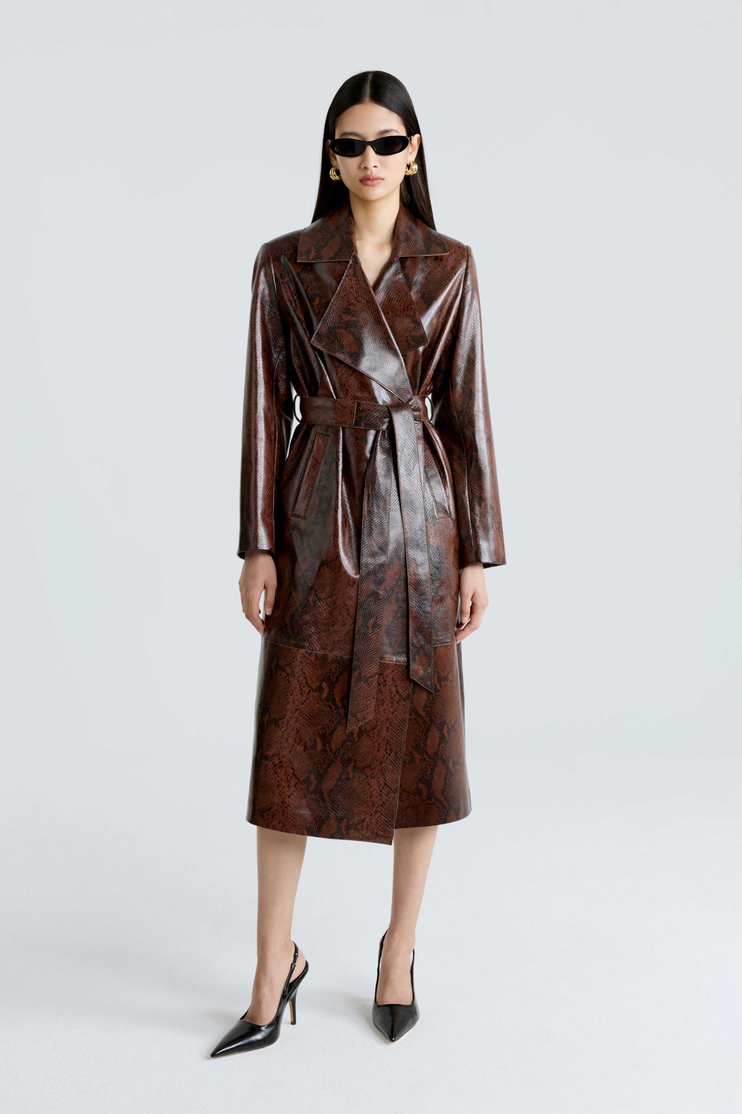 Model is wearing the Amina Python Belted Leather Coat Front