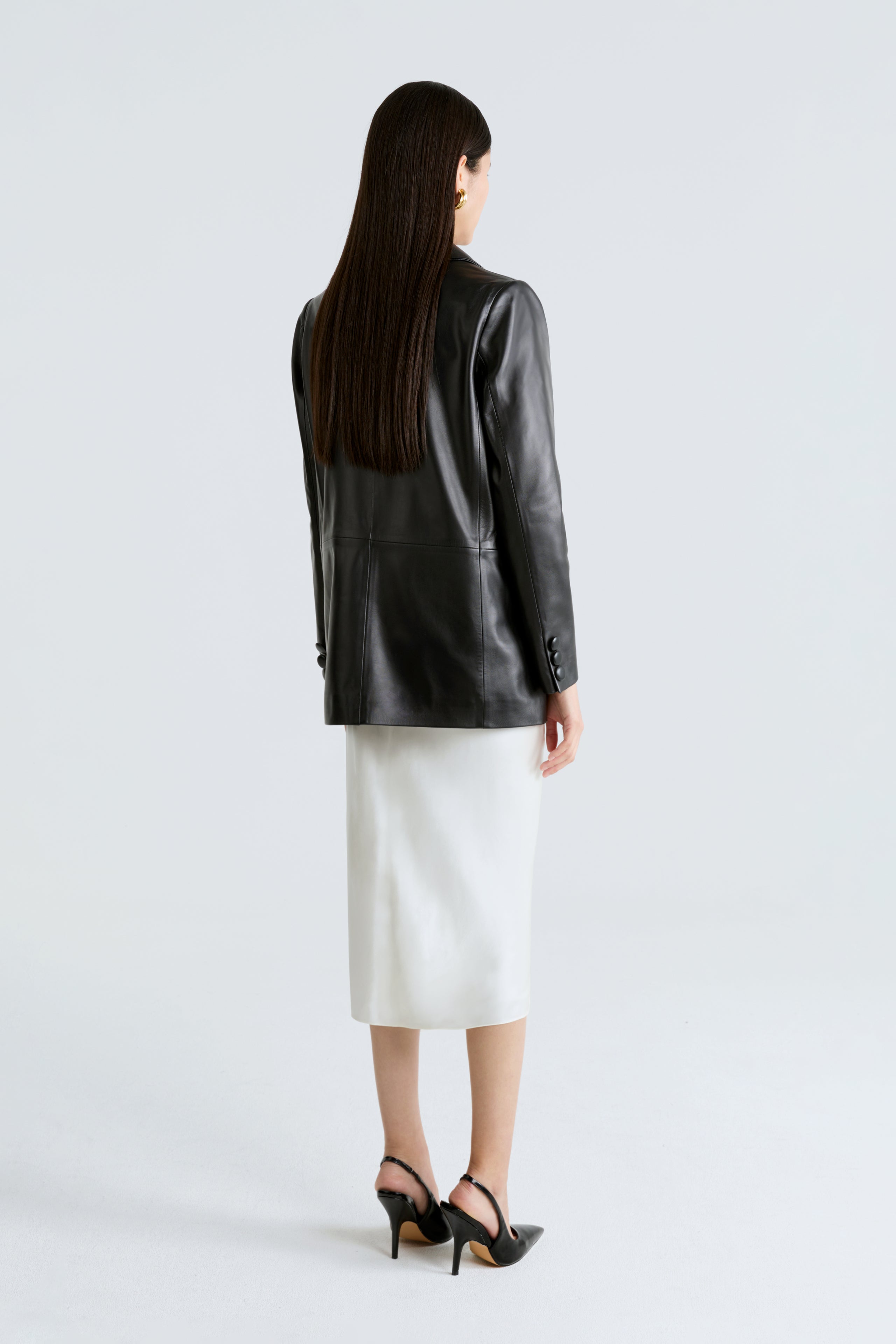 Model is wearing the Amura Black Relaxed Leather Blazer Back