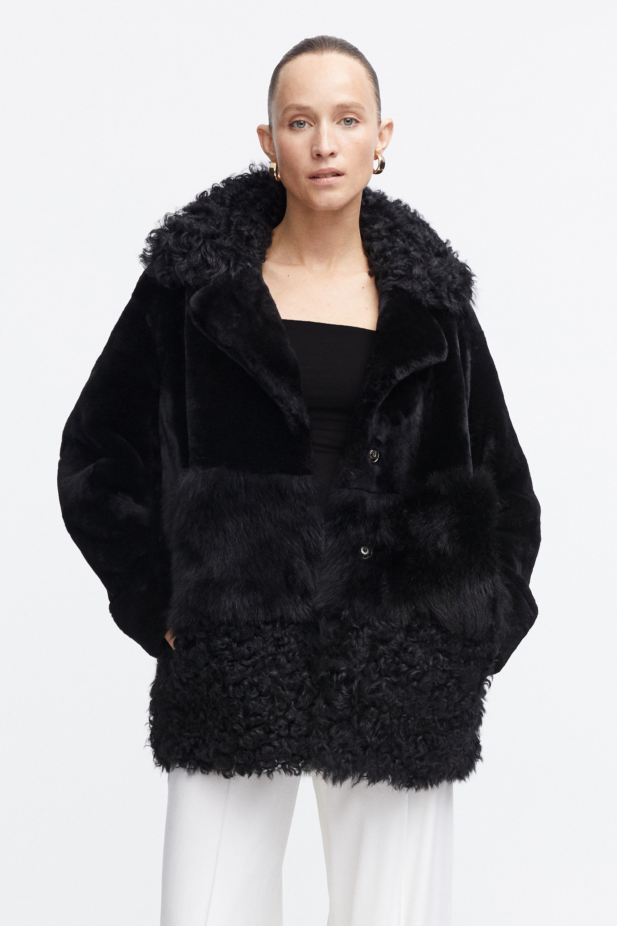 Model is wearing the Anouk Black Luxurious Shearling Coat Close Up