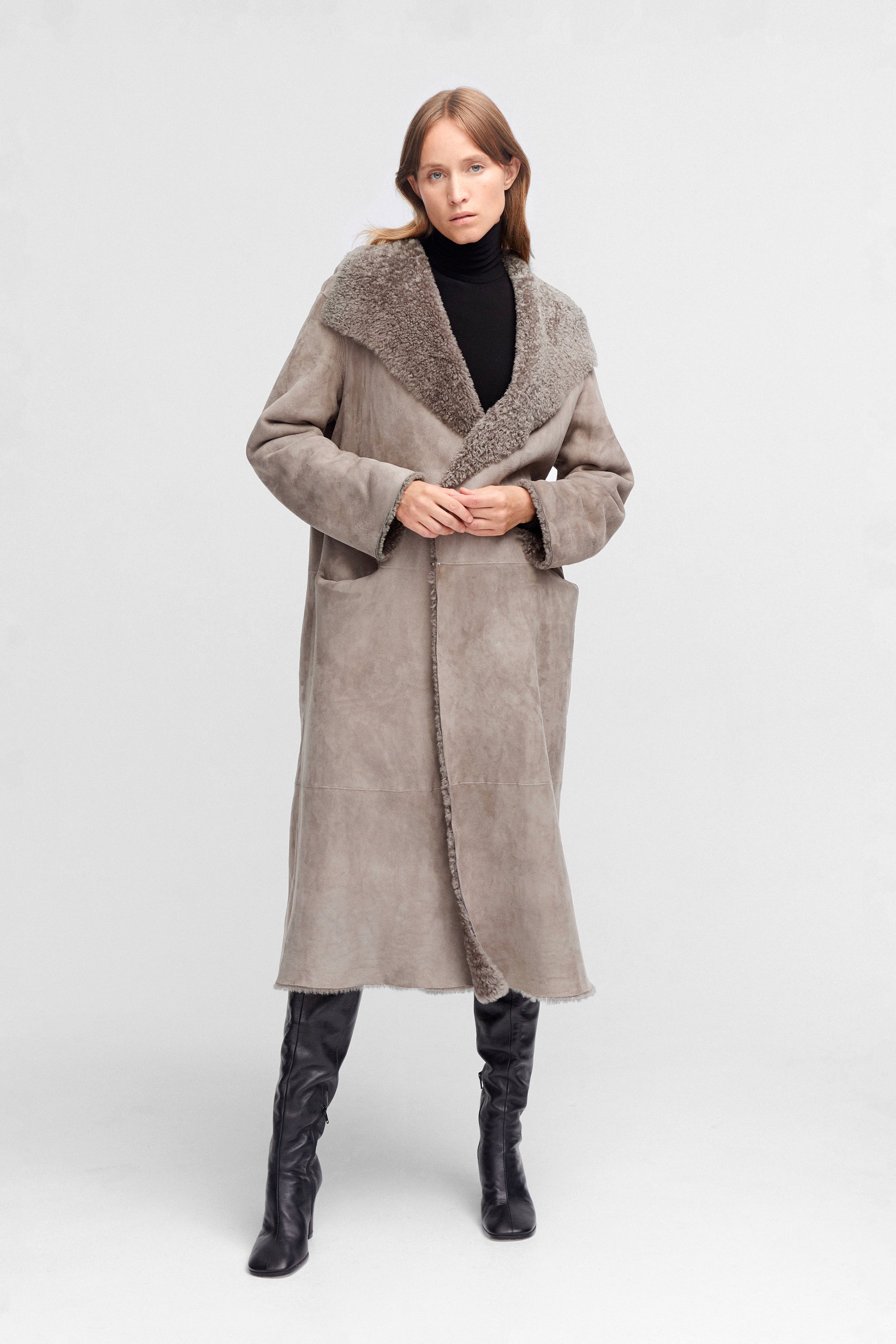 Model is wearing the Birthday Coat Iceland Grey Draped Shearling Coat Front