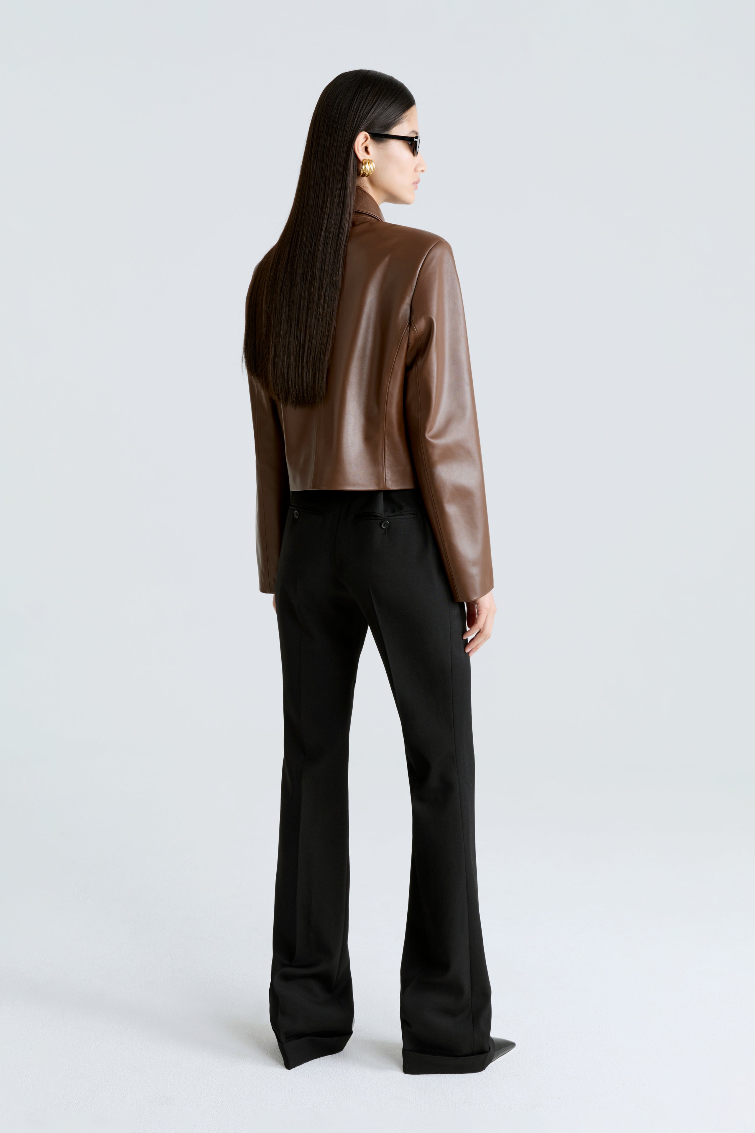Model is wearing the Bleeker Milk Chocolate Cropped Leather Jacket Back