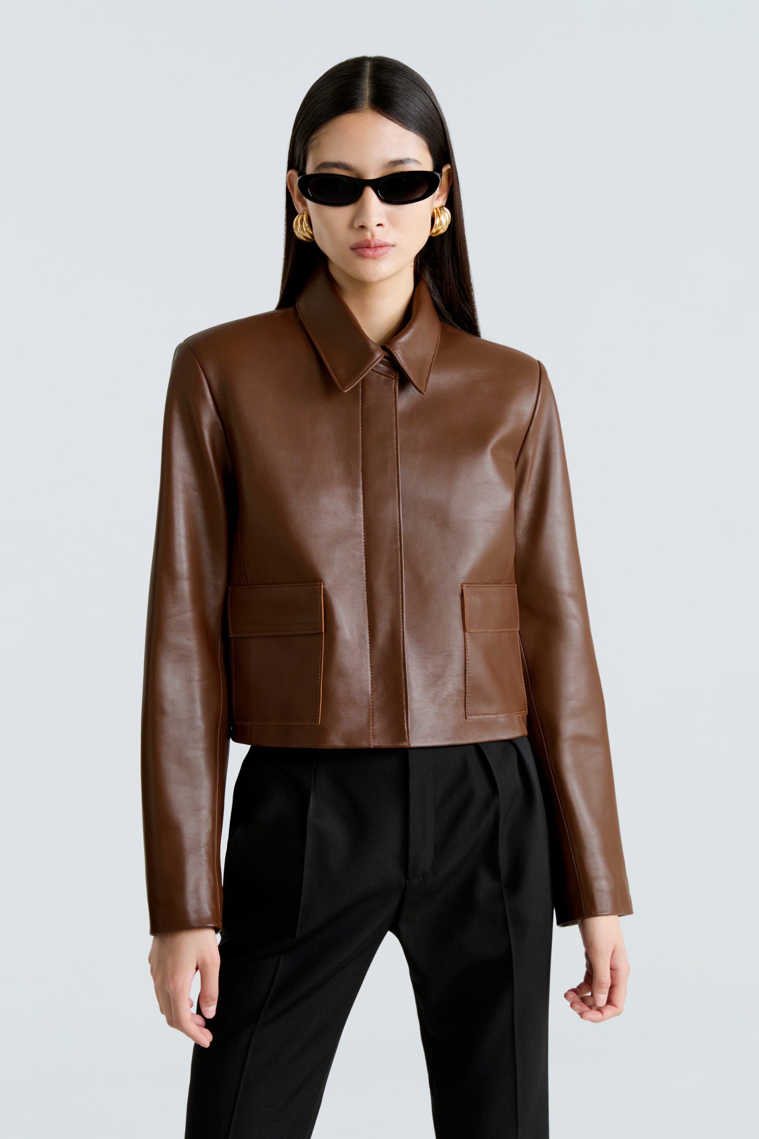 Model is wearing the Bleeker Milk Chocolate Cropped Leather Jacket Close Up