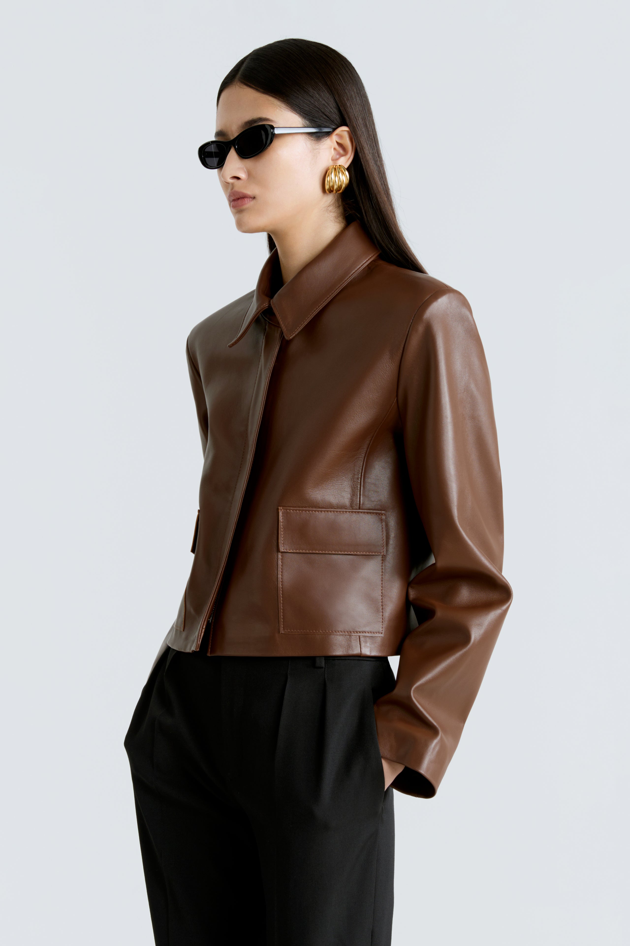 Model is wearing the Bleeker Milk Chocolate Cropped Leather Jacket Close Up