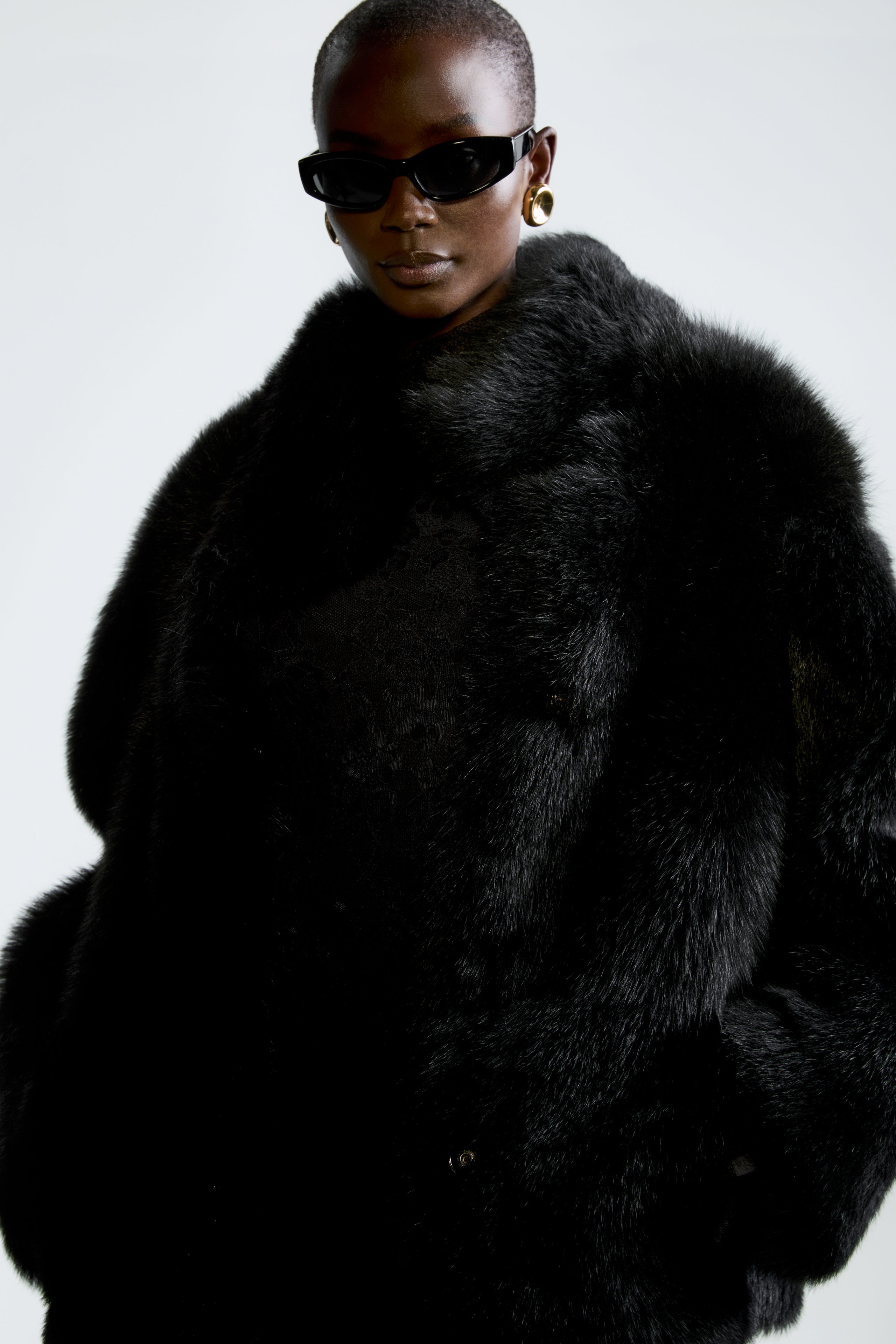 Model is wearing the Nour Hammour Carolyn Black - Luxurious Après-Ski Coat - Close Up