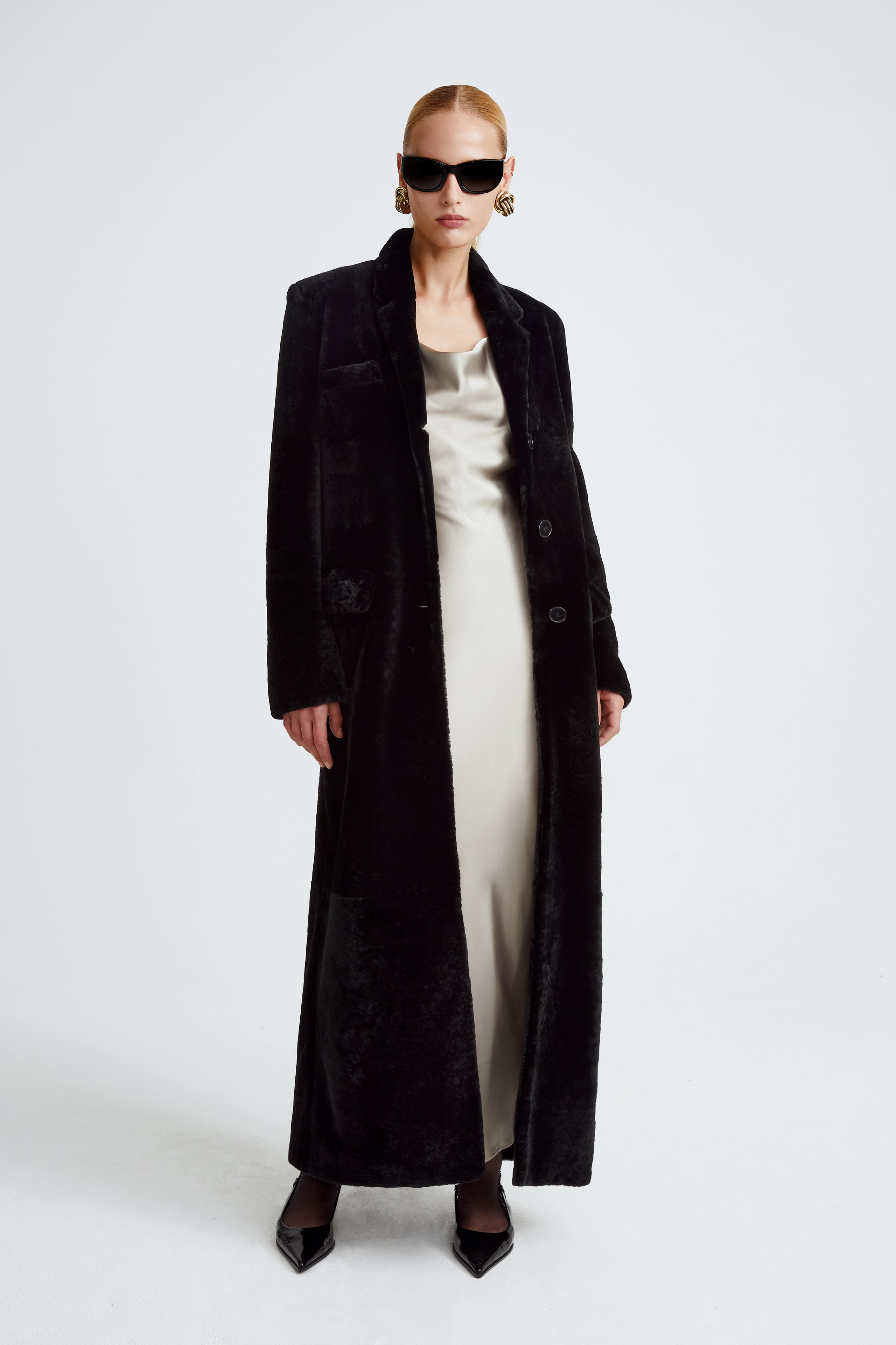 Model is wearing the Celine Shearling Black Long Shearling Coat Front