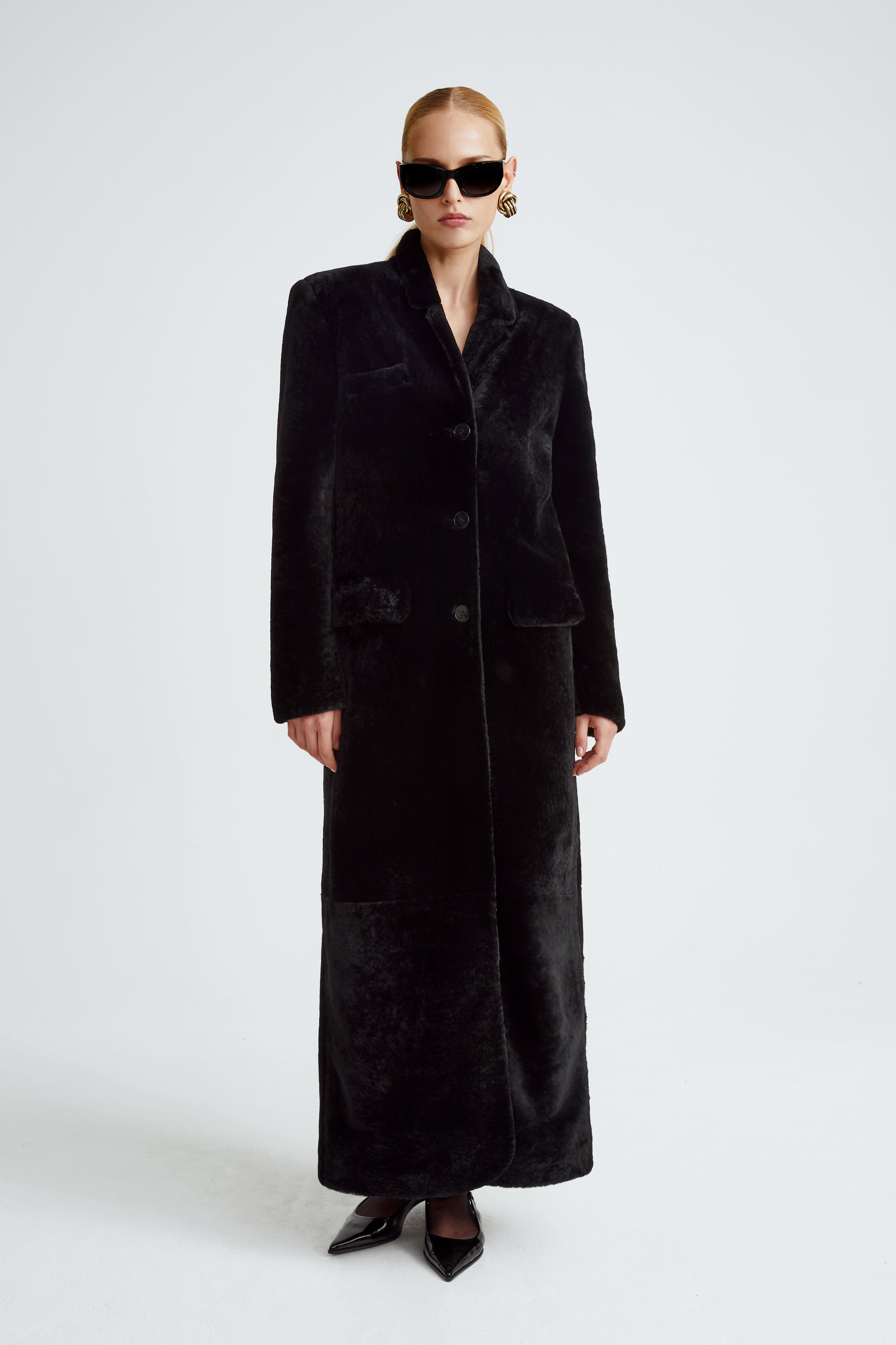 Model is wearing the Celine Shearling Black Long Shearling Coat Front