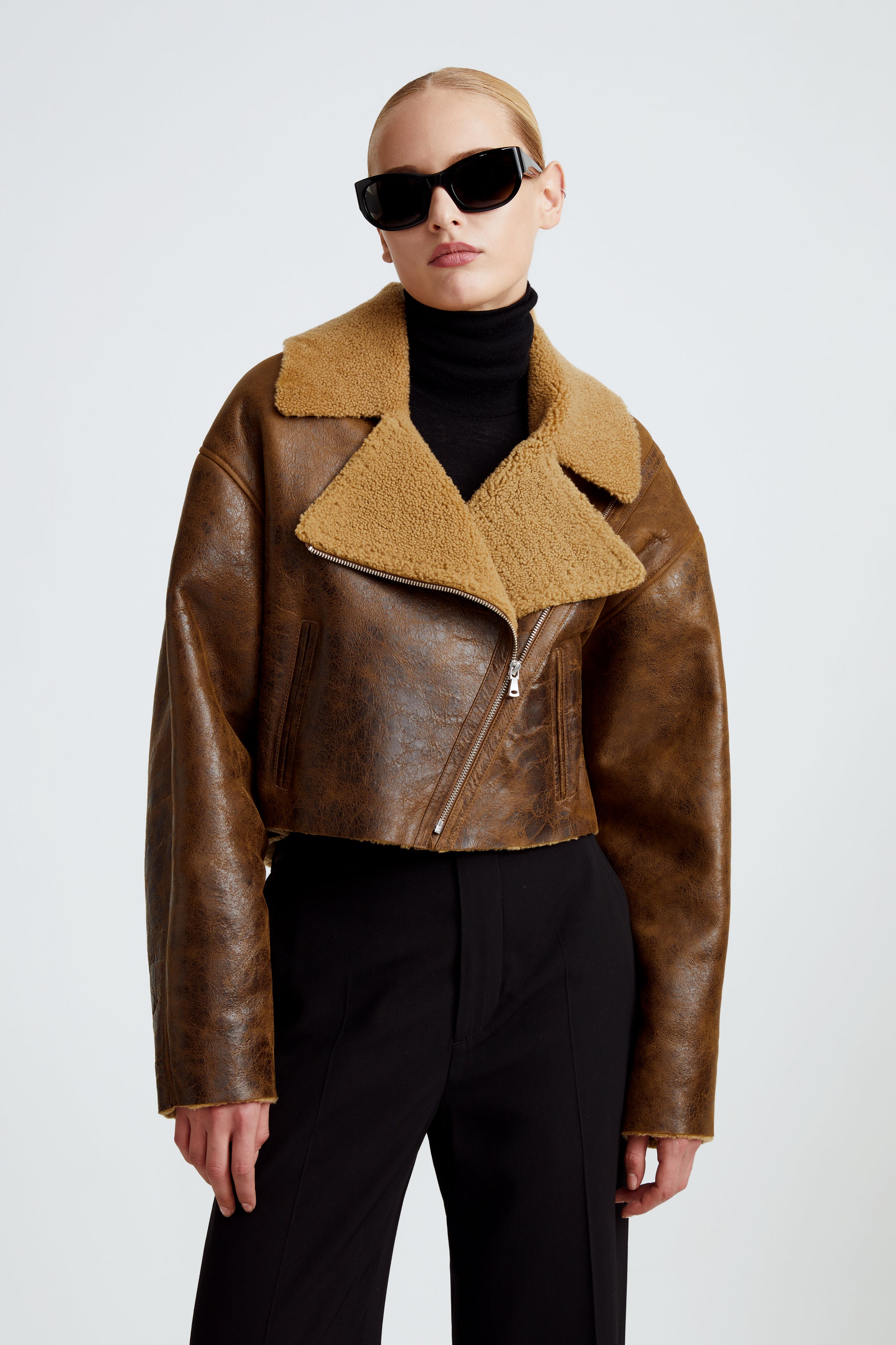 Model is wearing the Colorado Brown Caramel Relaxed Shearling Jacket Close Up