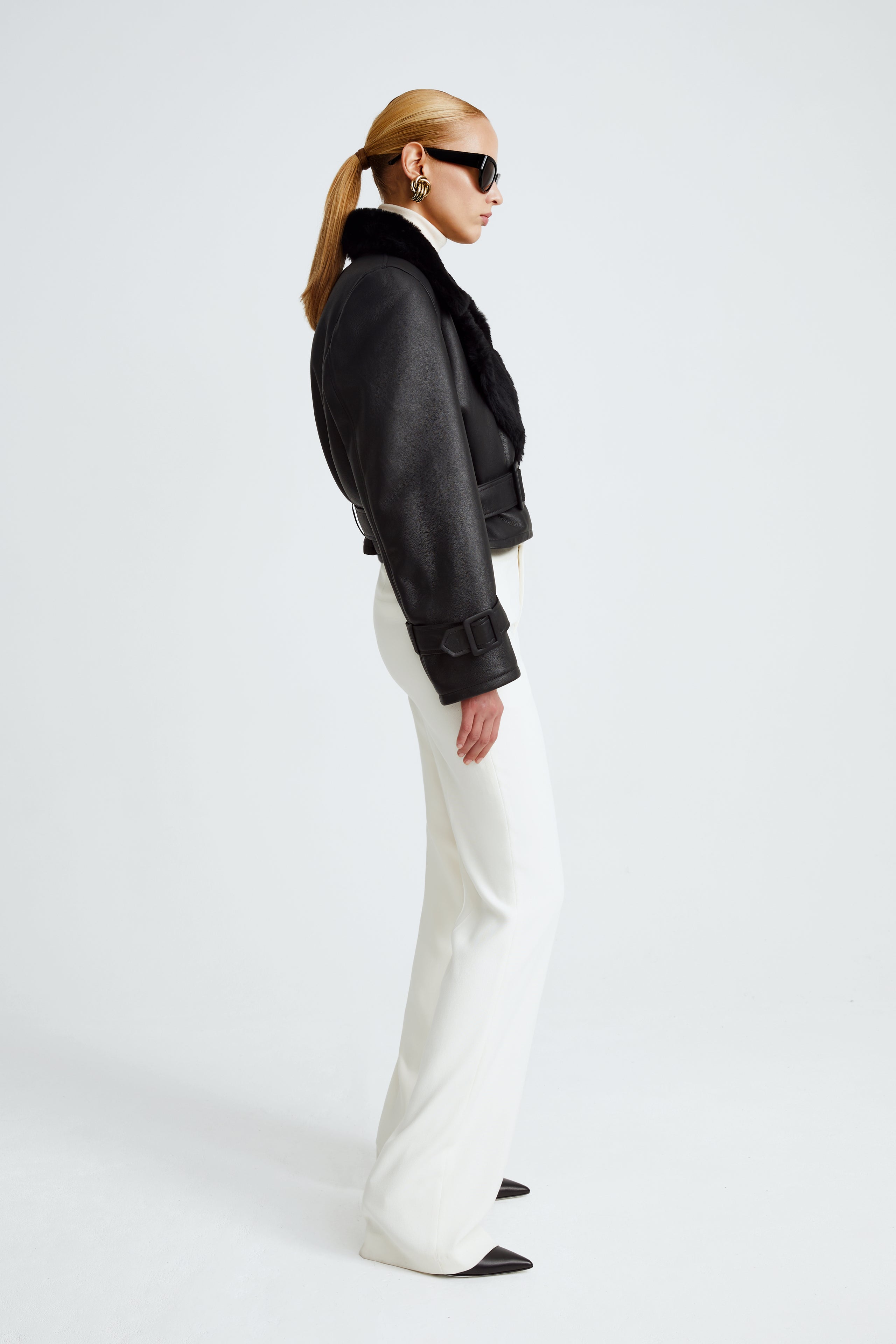 Model is wearing the Hatti Shearling Black Cropped Shearling Jacket Side