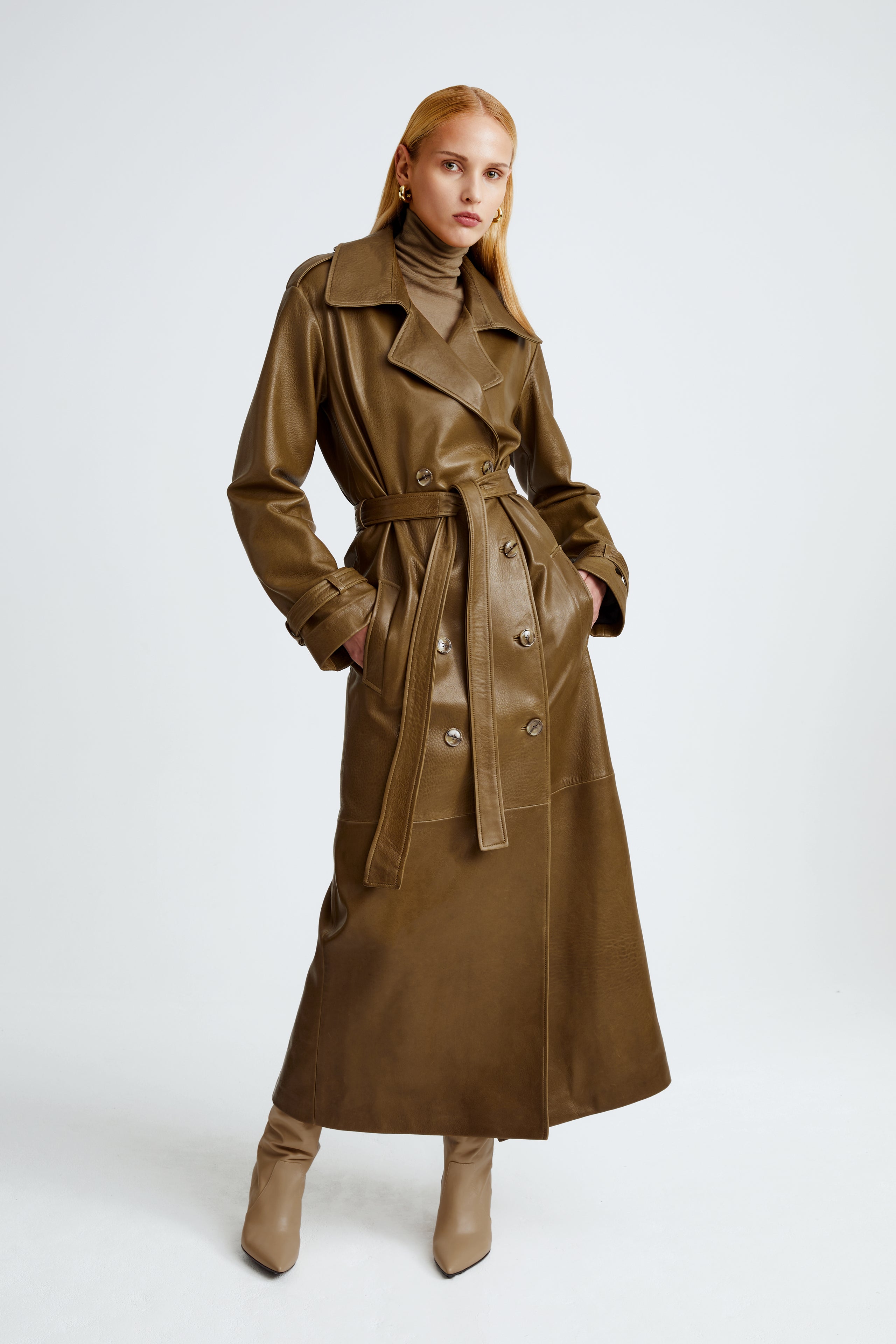 Model is wearing the Haya Zeytoun Belted Leather Trench Coat Front