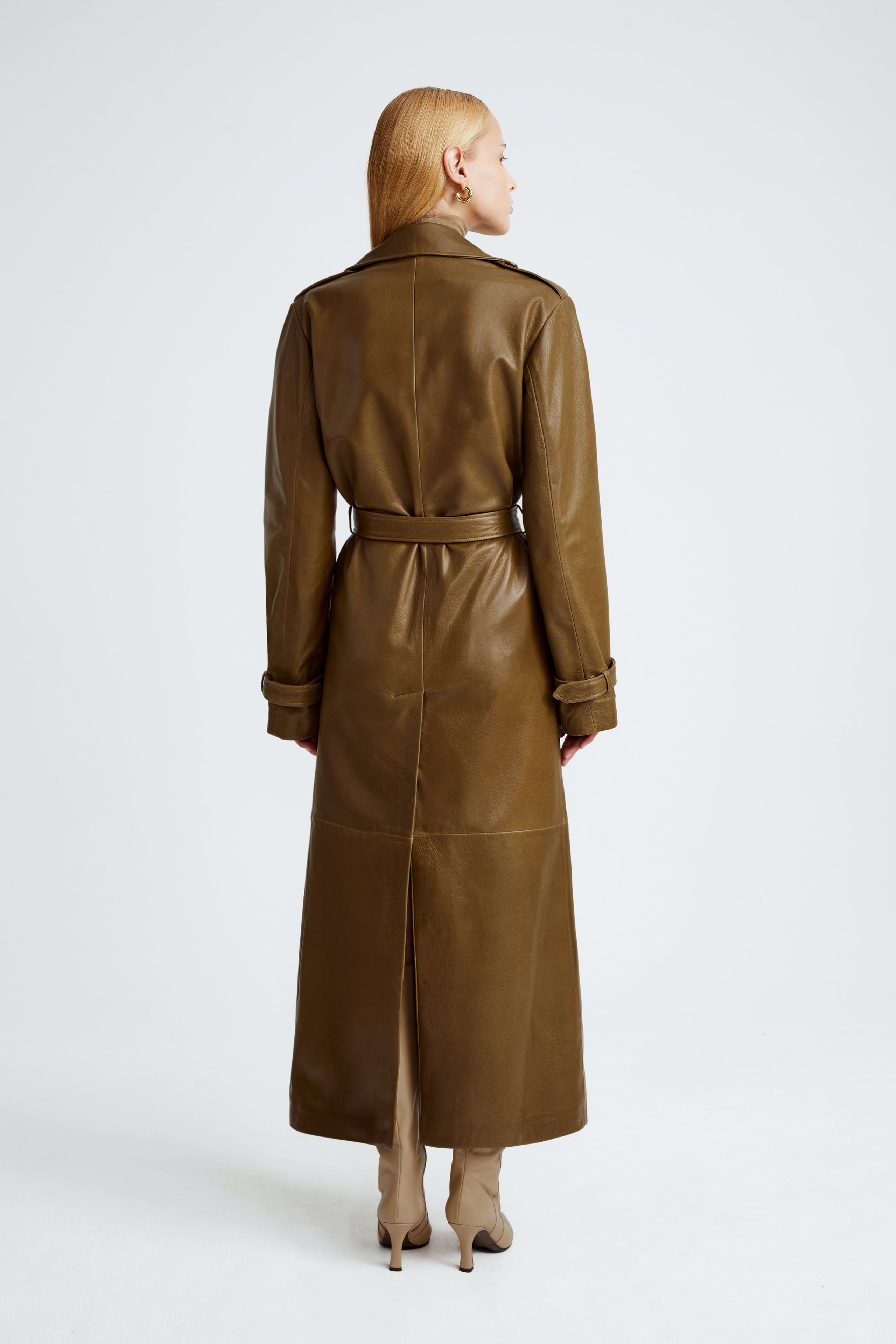 Model is wearing the Haya Zeytoun Belted Leather Trench Coat Back