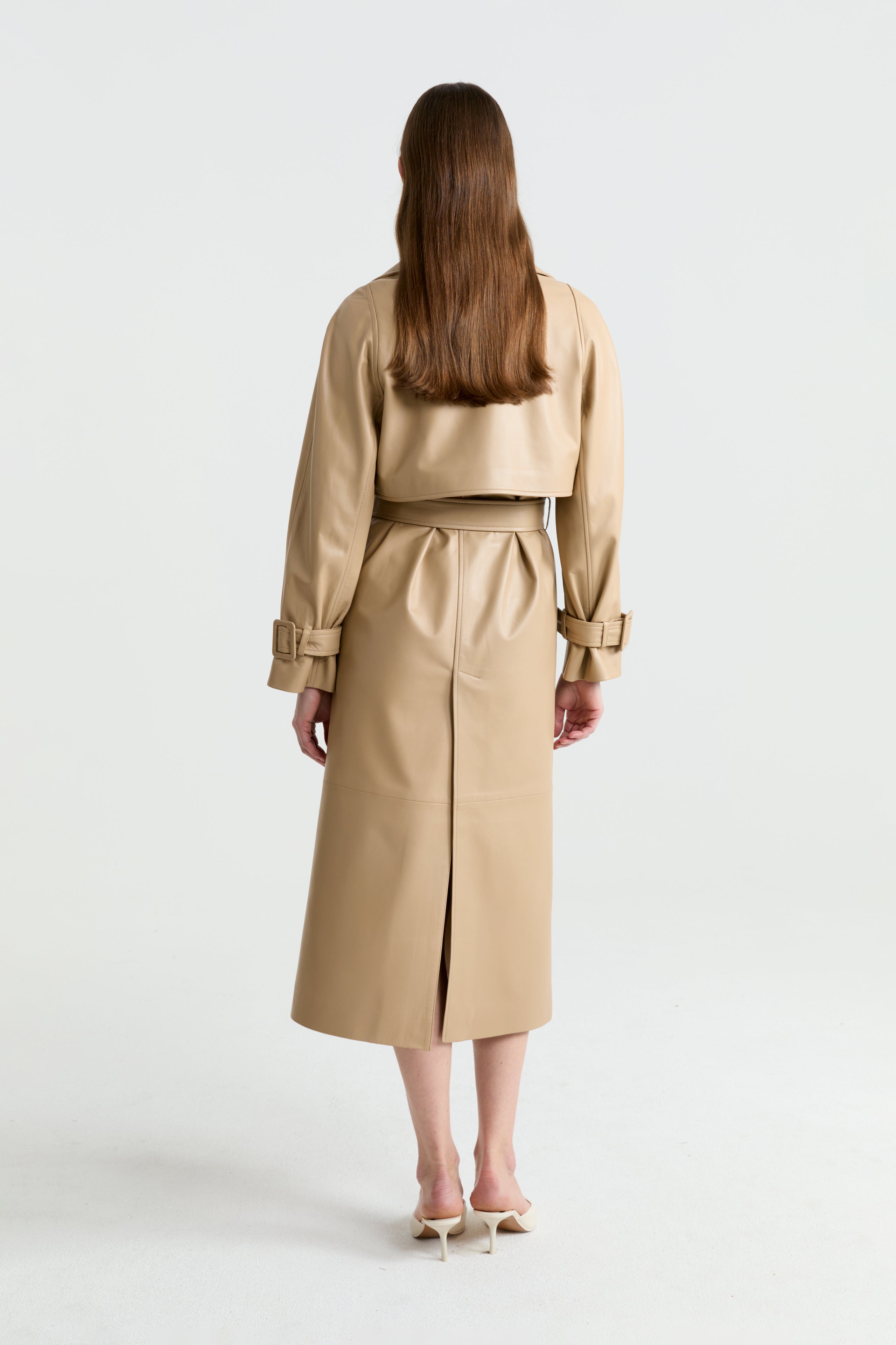 Model is wearing the Henri Beige Leather Trench Coat Back