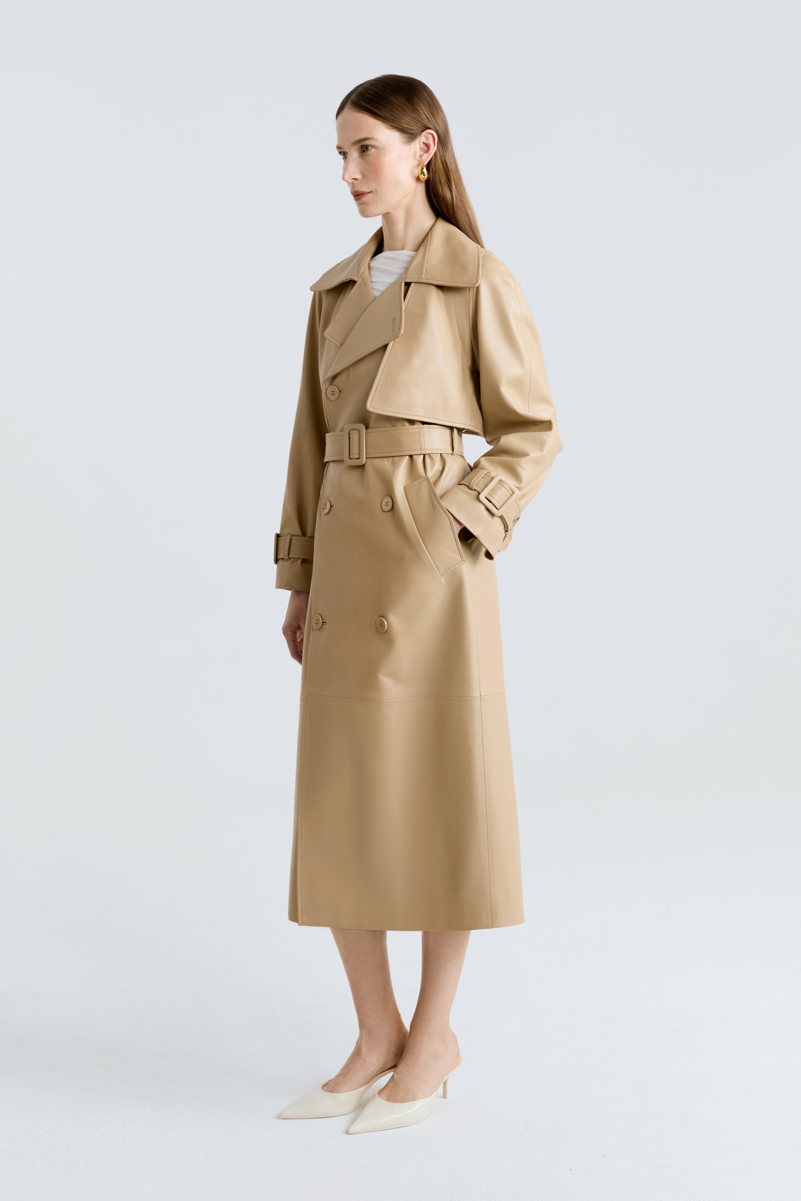 Model is wearing the Henri Beige Leather Trench Coat Side