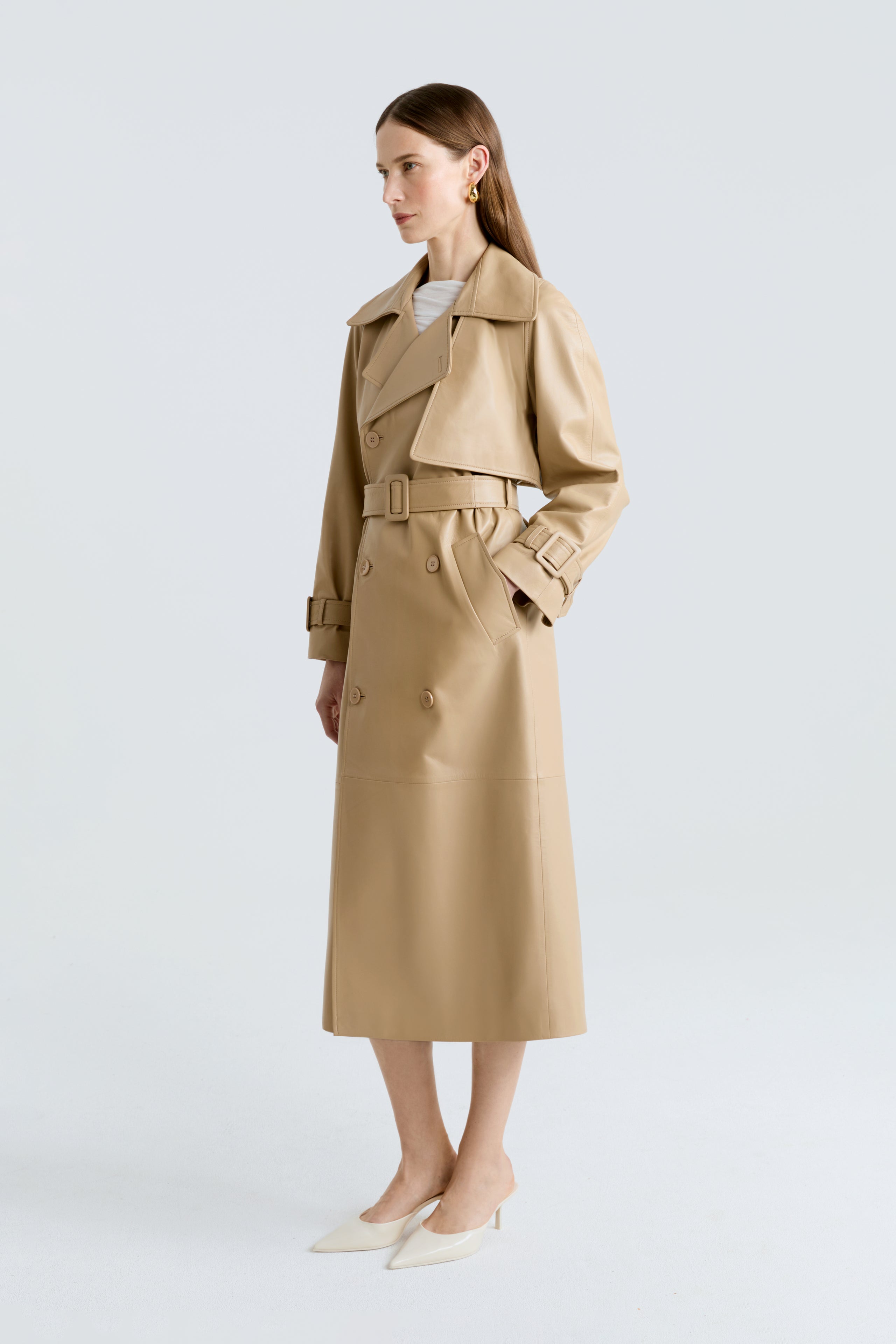 Model is wearing the Henri Beige Oversized Leather Trench Side