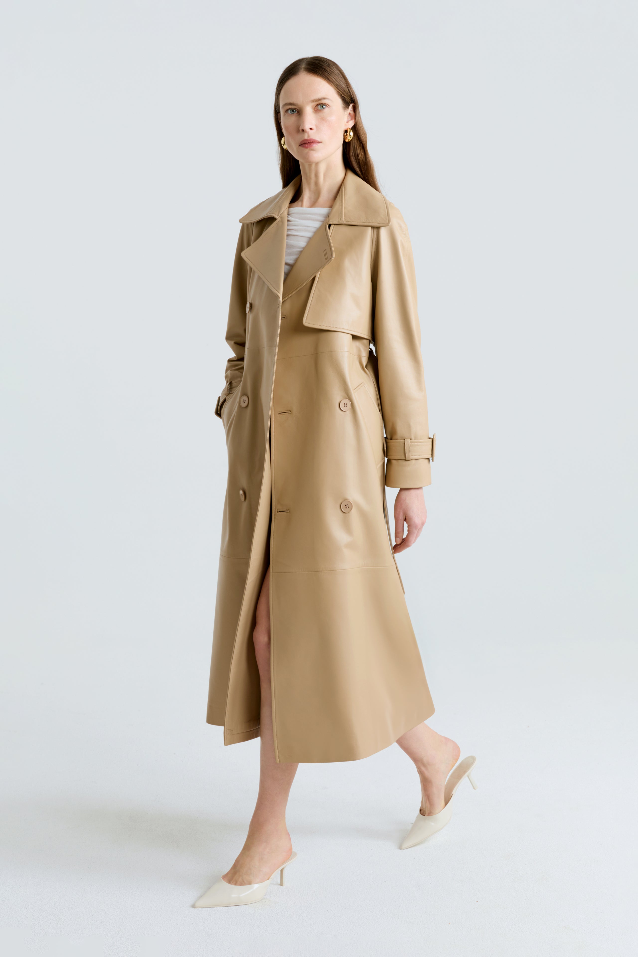 Model is wearing the Henri Beige Leather Trench Coat Side