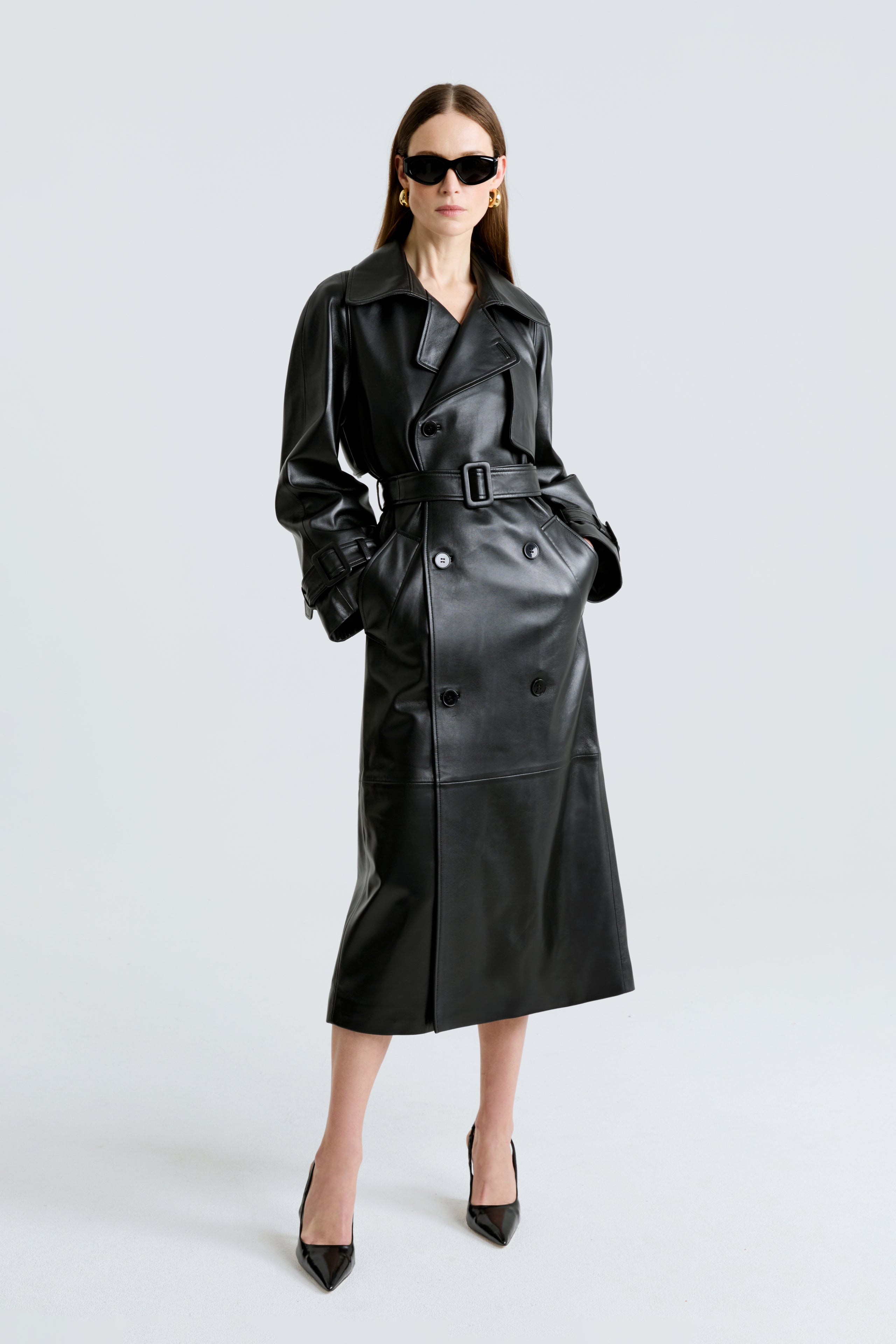 Model is wearing the Henri Black Leather Trench Coat Front