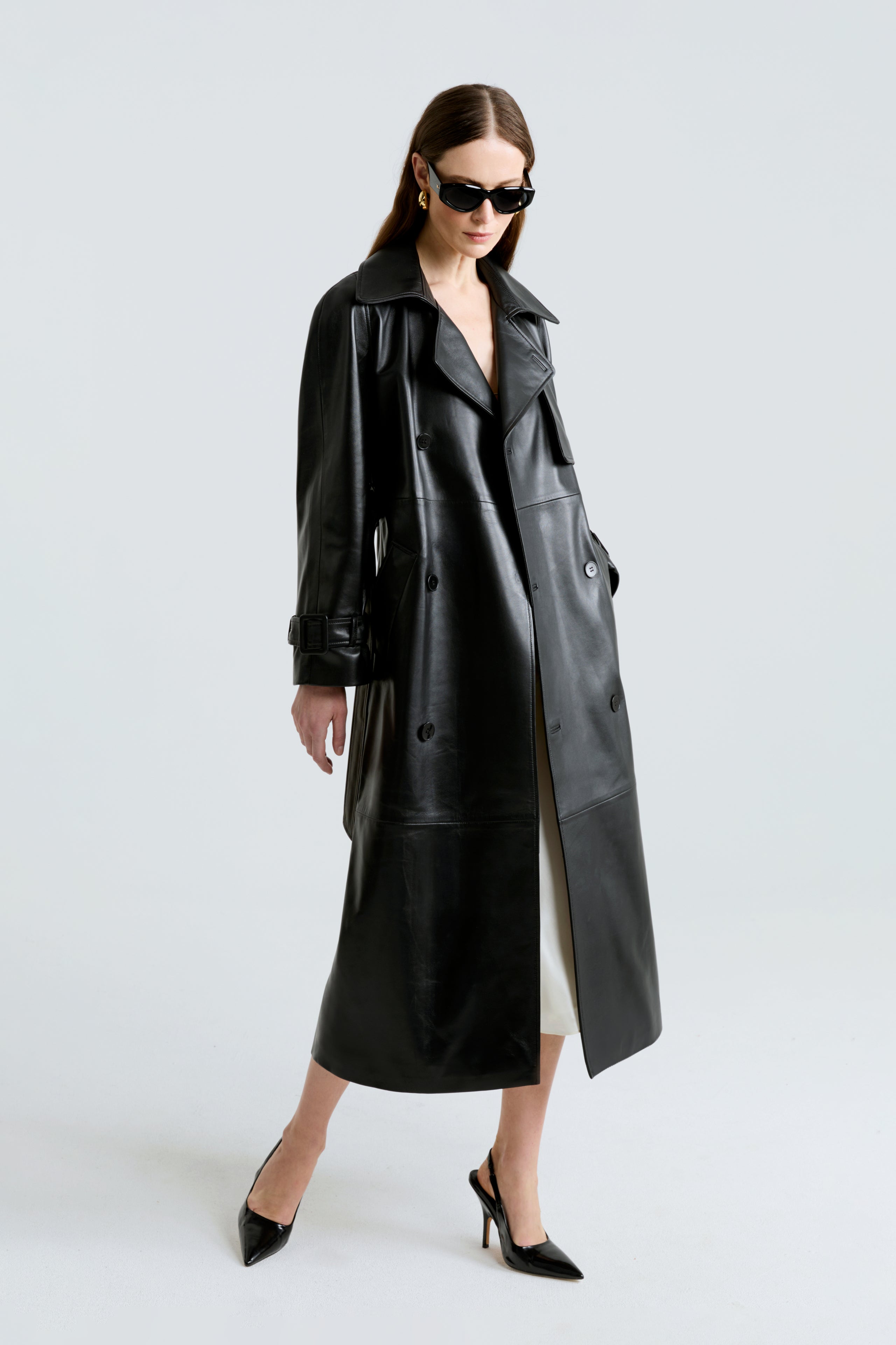 Model is wearing the Henri Black Leather Trench Coat Front