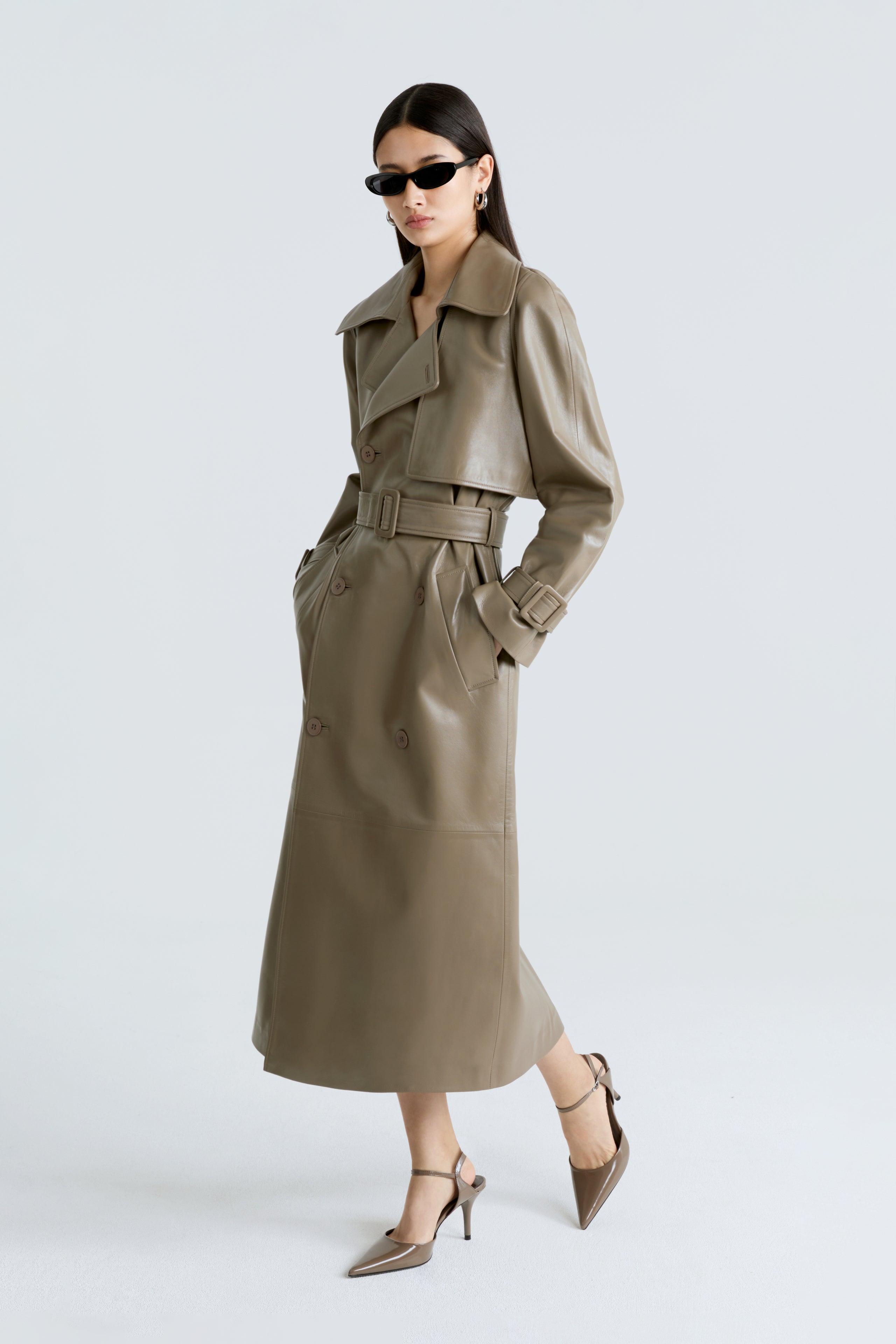 Model is wearing the Henri Cepe Leather Trench Coat Side