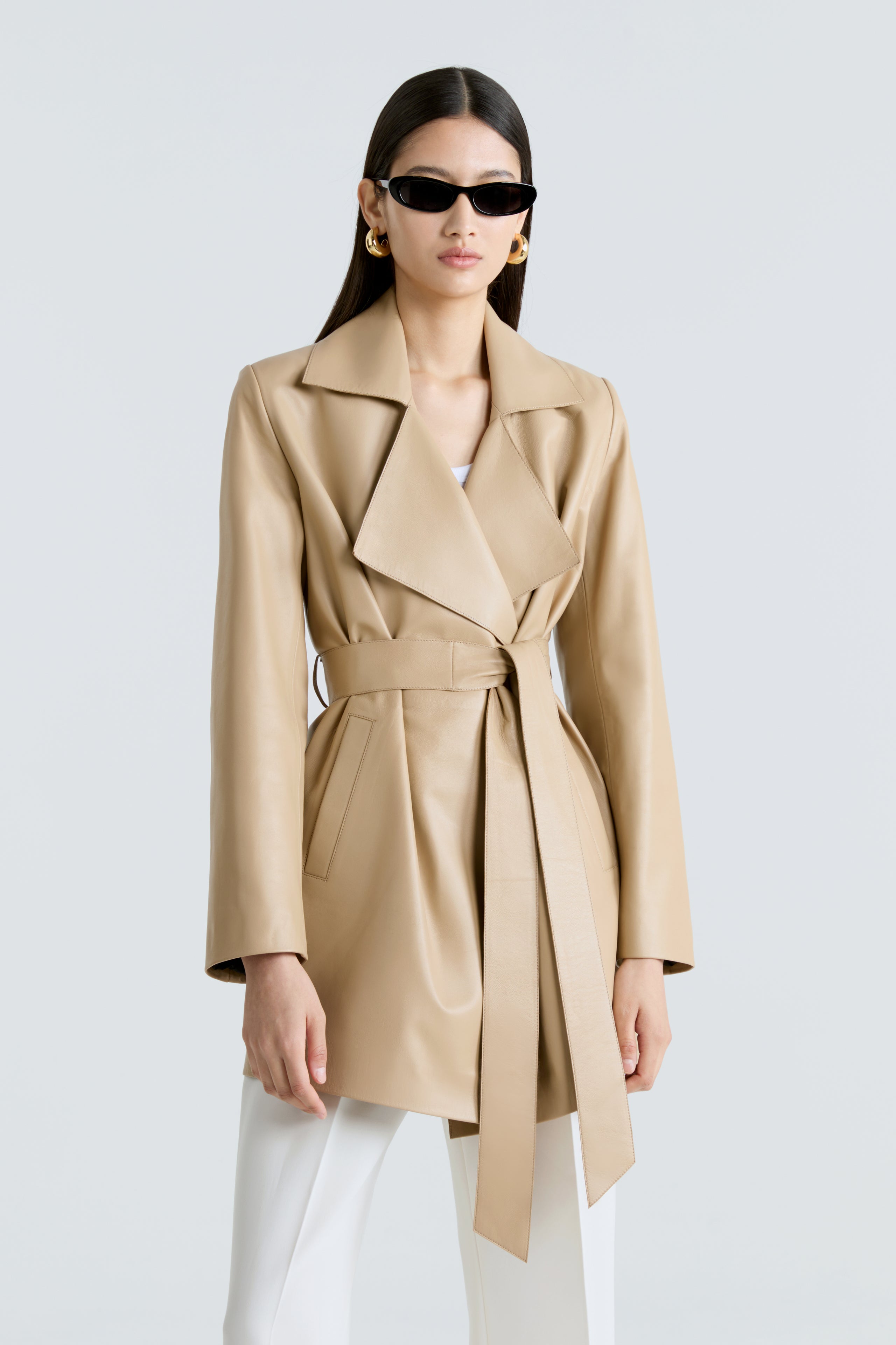 Model is wearing the Kerri Beige Belted Ladylike Jacket Close Up