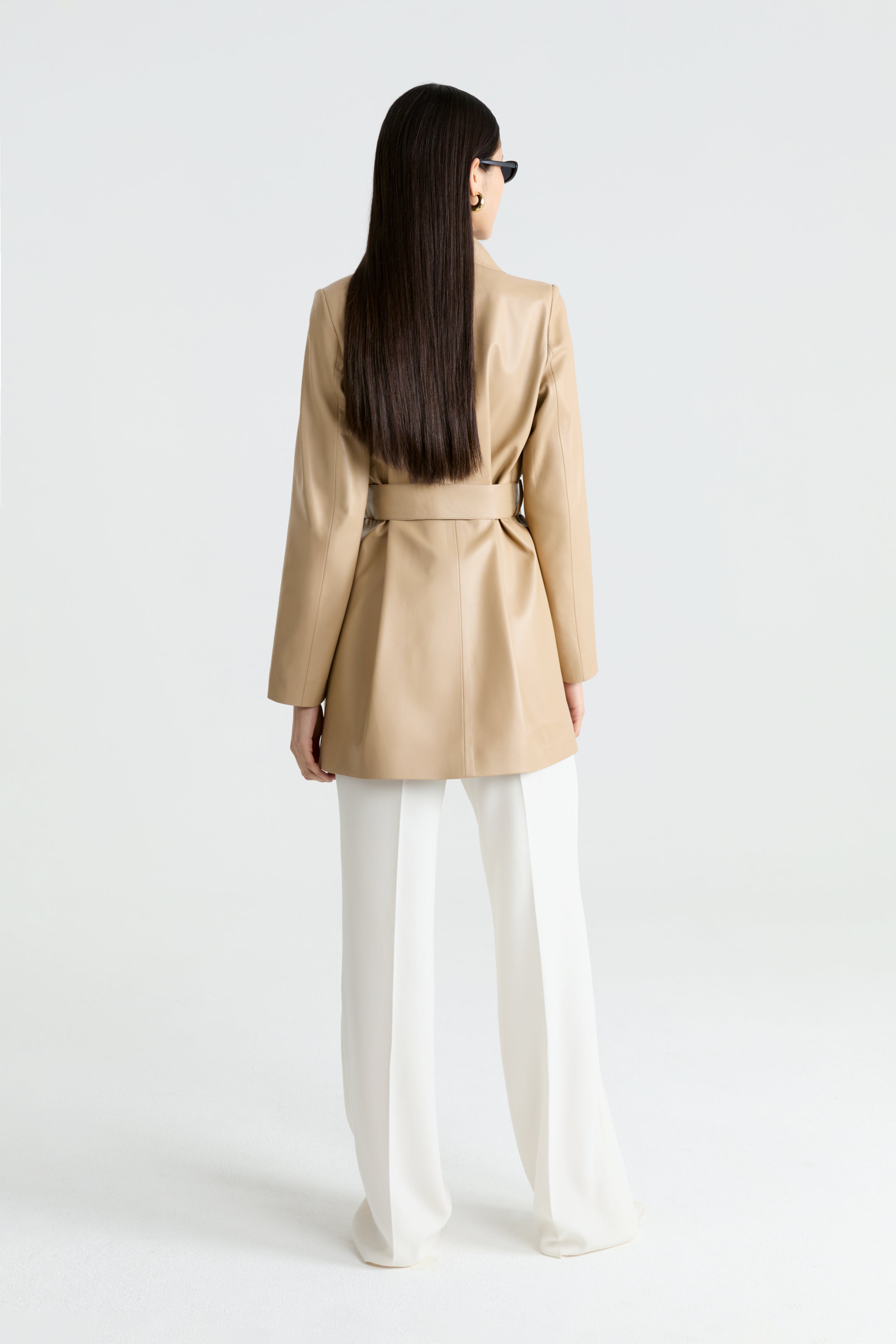 Model is wearing the Kerri Beige Belted Ladylike Jacket Back