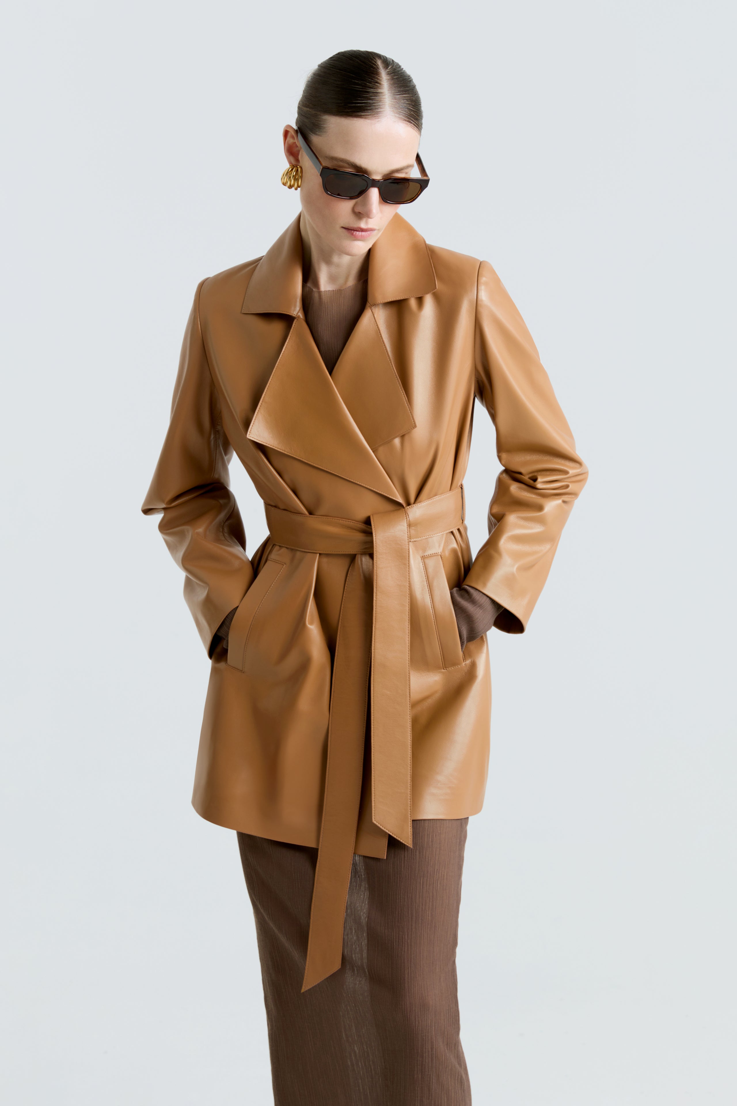 Model is wearing the Kerri Camel Belted Ladylike Jacket Close Up