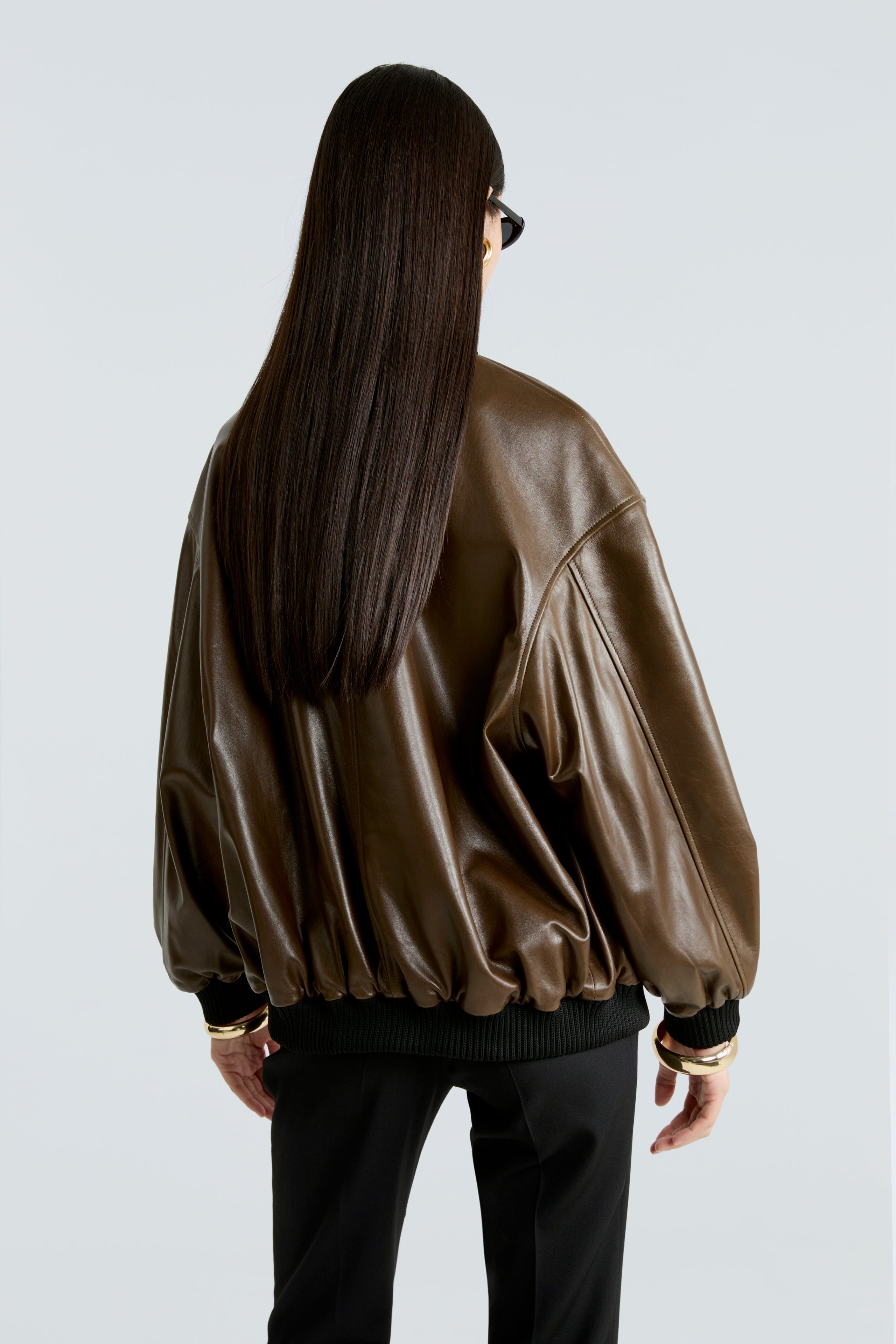 Model is wearing the Marly Nicoise Leather Bomber Jacket Back