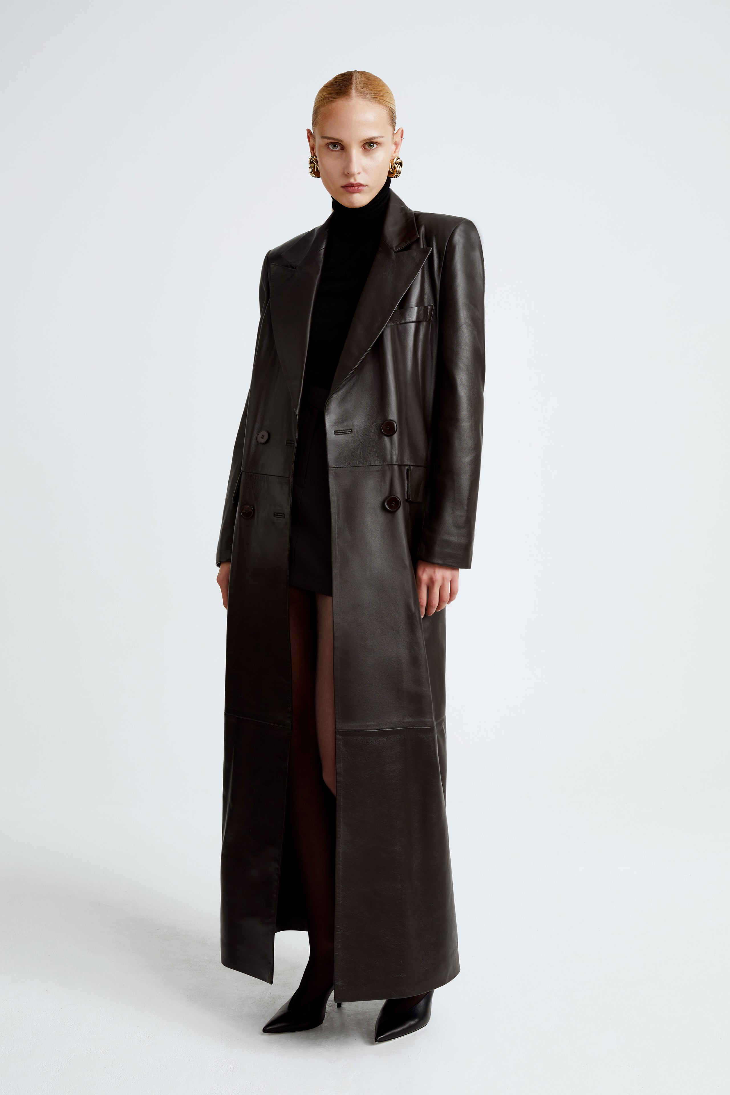 Model is wearing the Misha Chocolat Fondant Long Leather Coat Front
