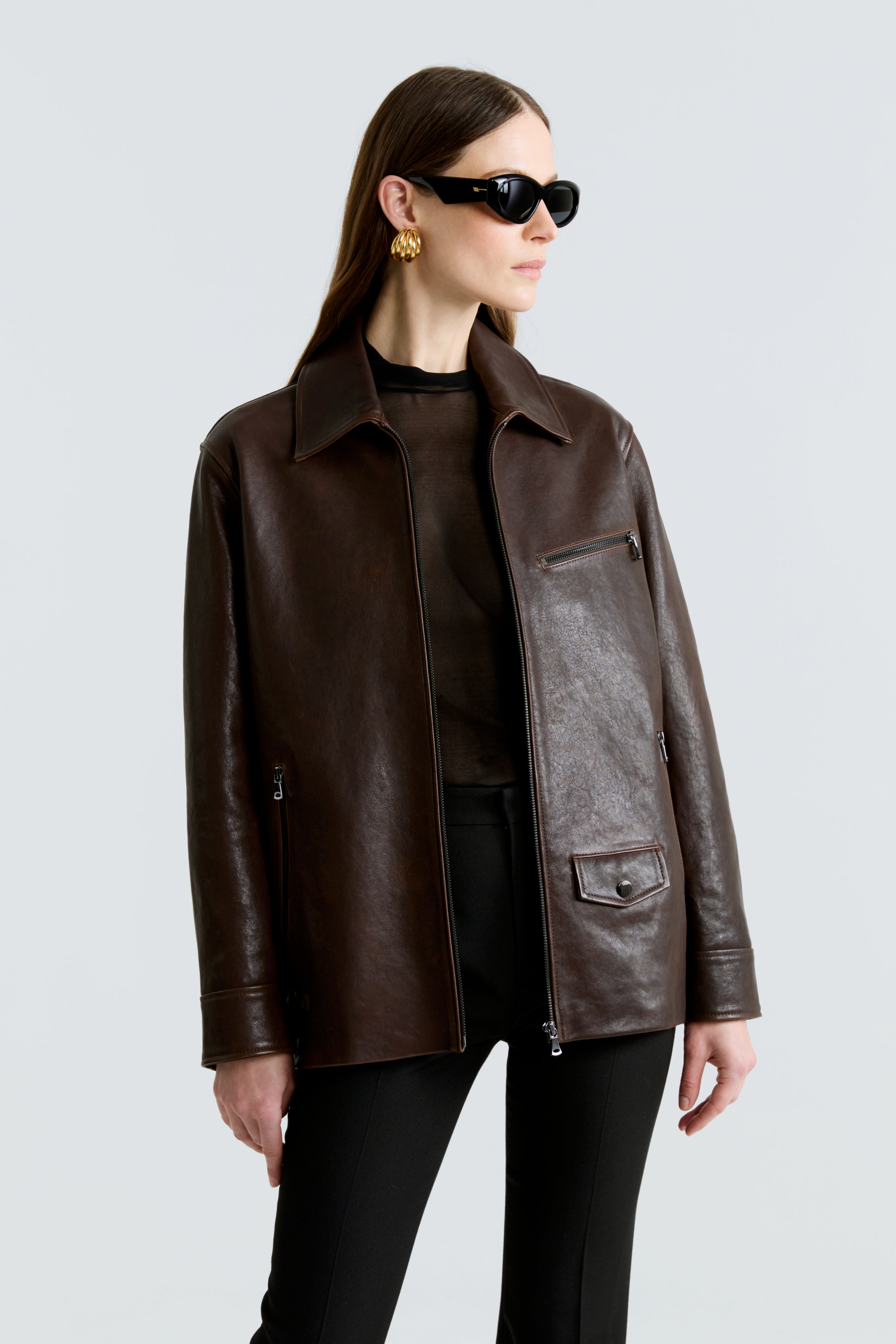 Model is wearing the Rayan Dark Brown Utilitarian Leather Jacket Close Up