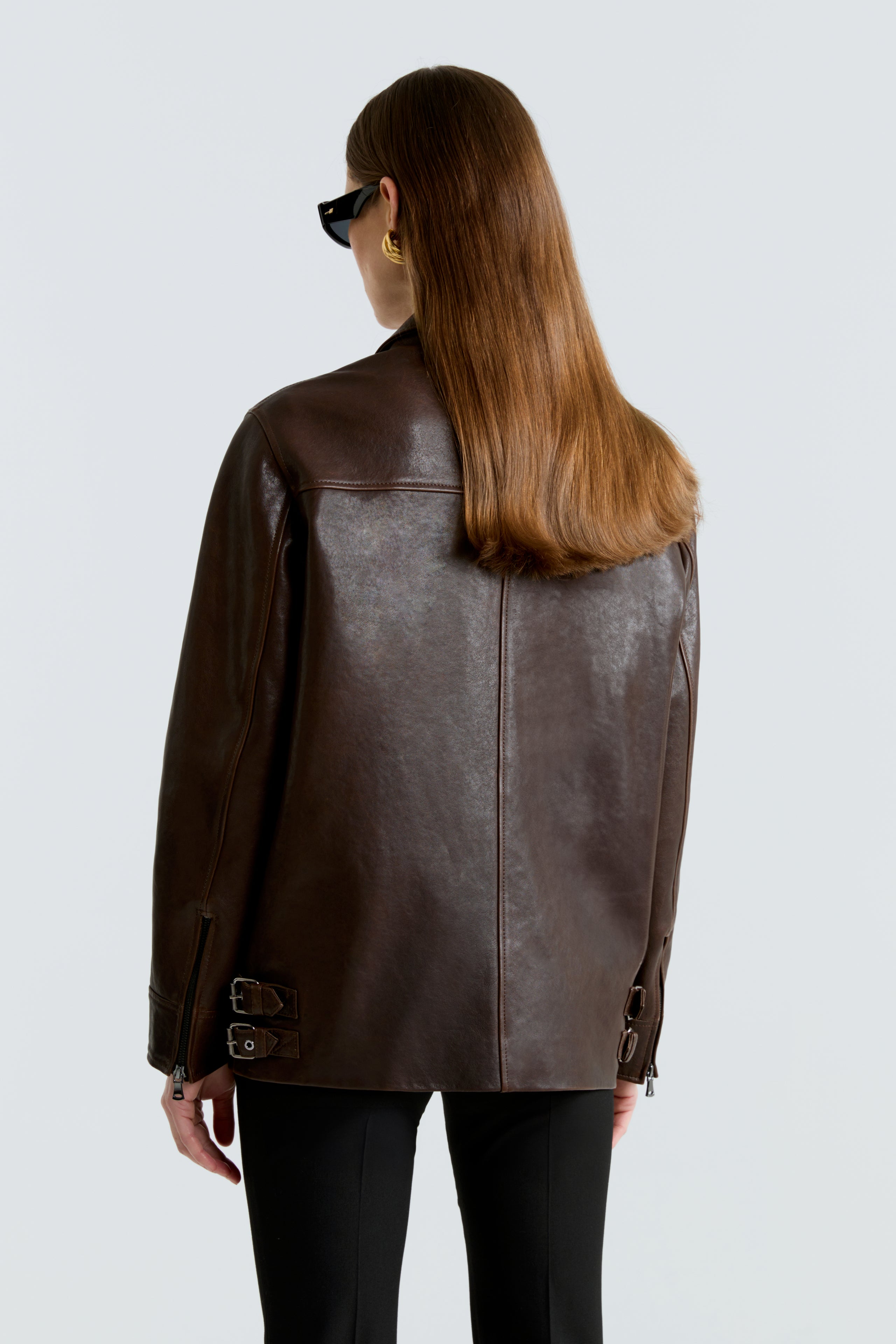 Model is wearing the Rayan Dark Brown Utilitarian Leather Jacket Back