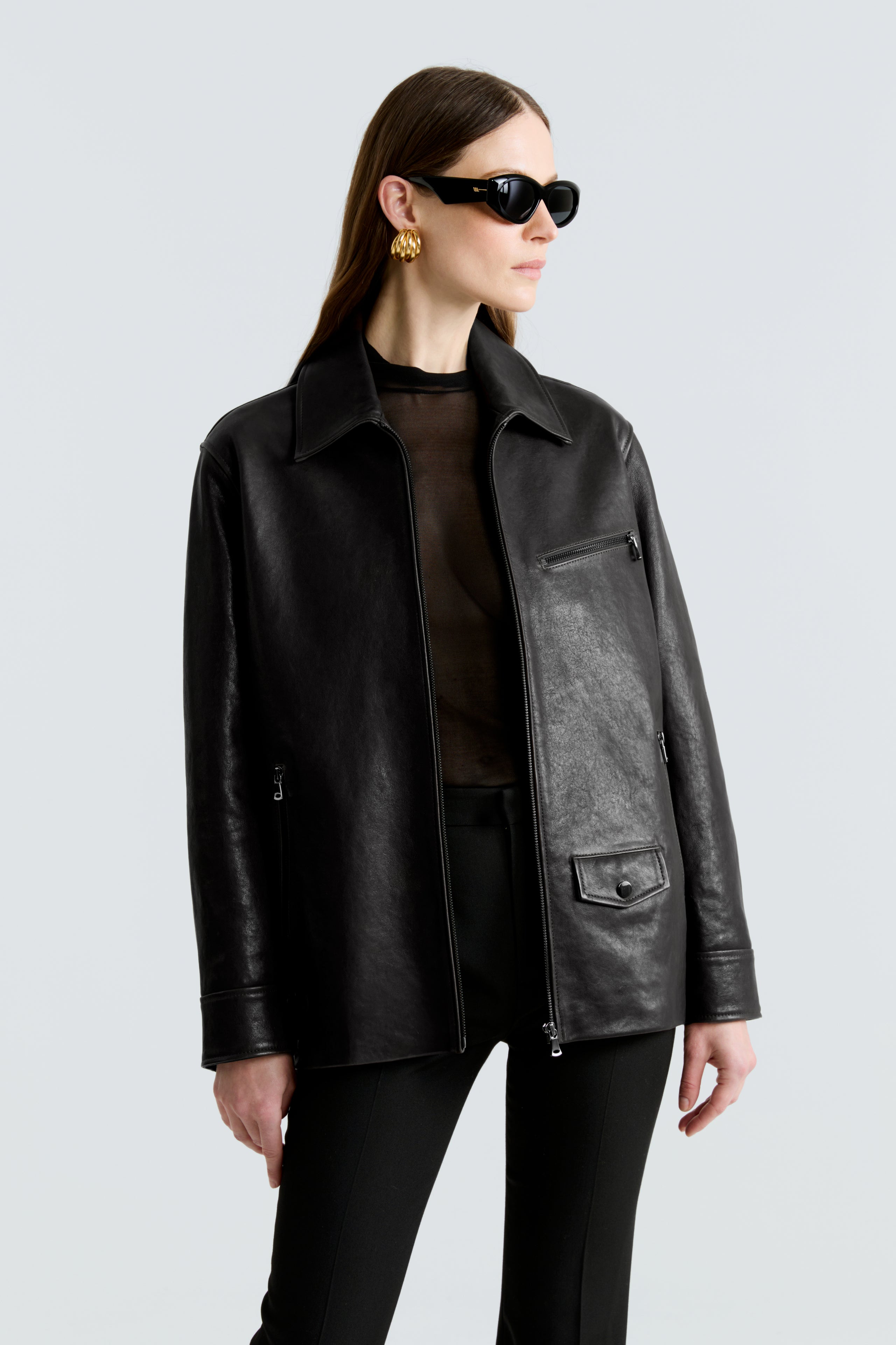Model is wearing the Rayan Black Utilitarian Leather Jacket Close Up