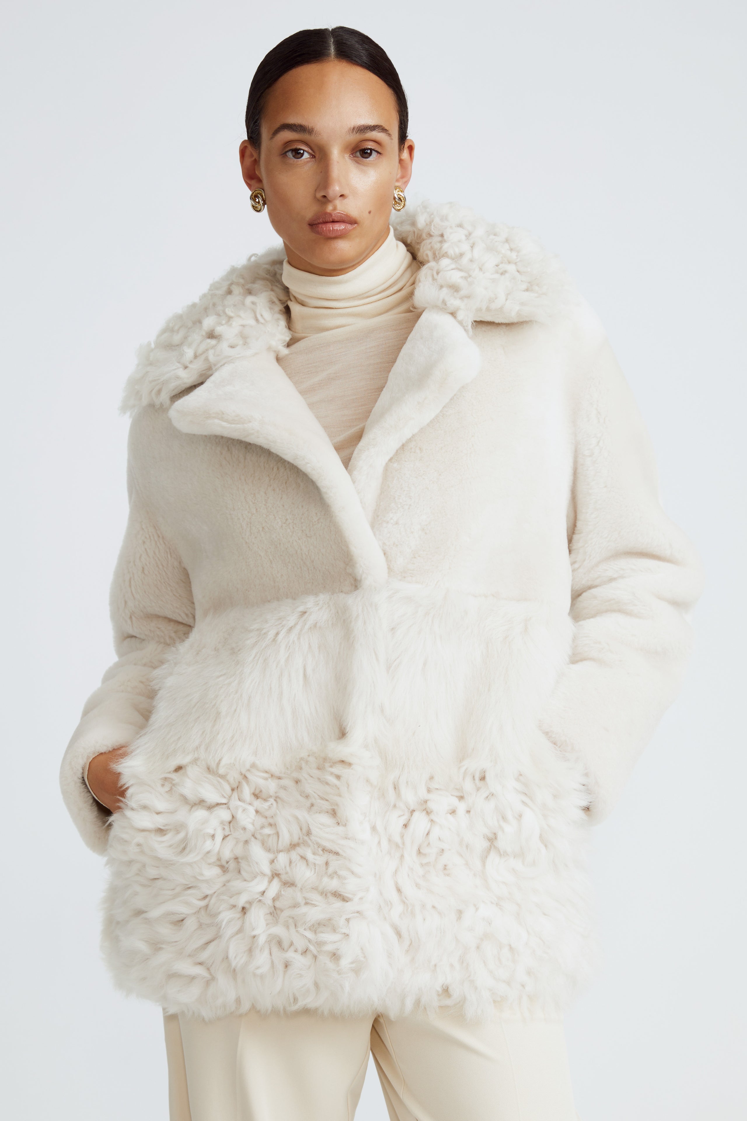Model is wearing the Anouk Marshmallow Luxurious Shearling Coat Close Up