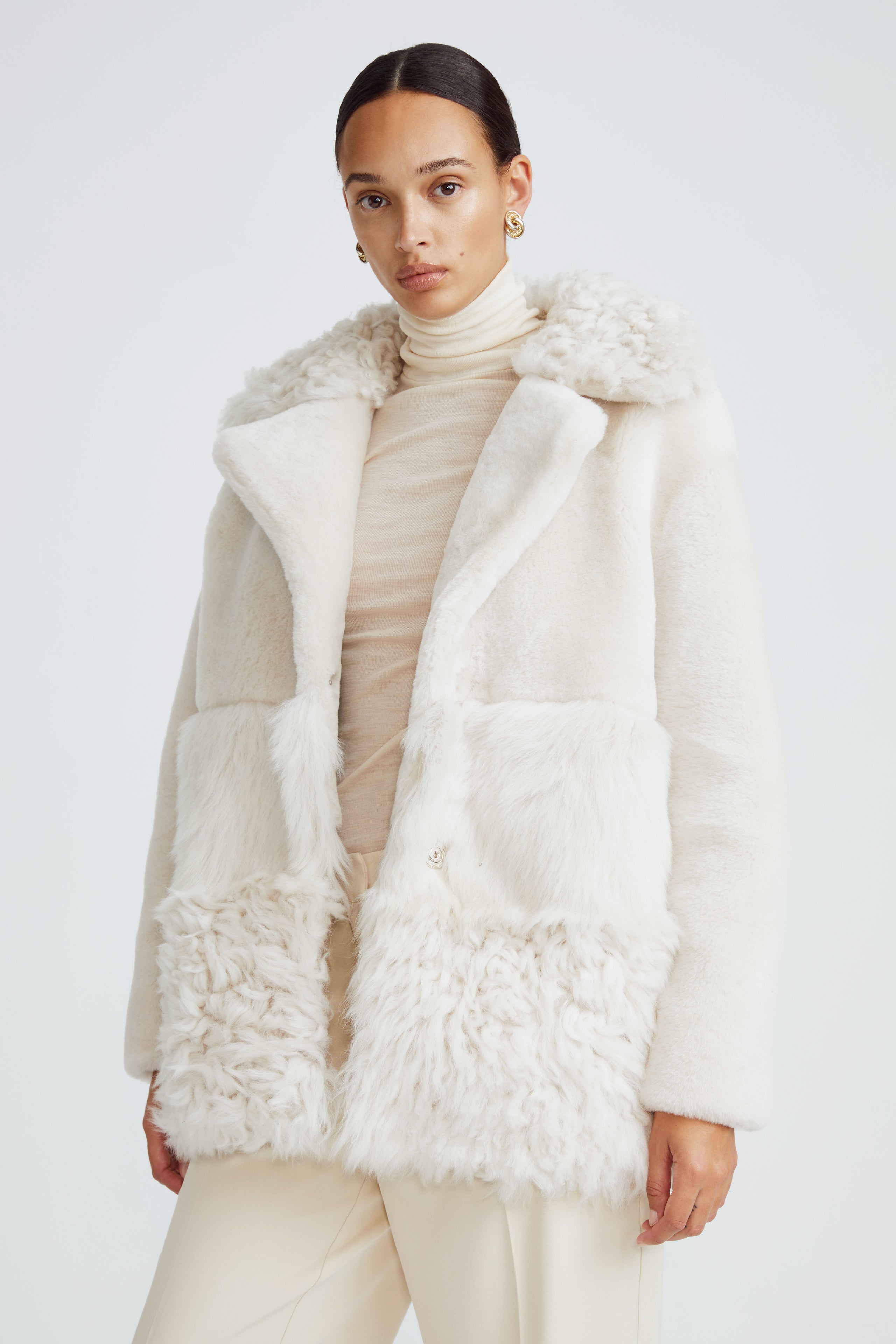Model is wearing the Anouk Marshmallow Luxurious Shearling Coat Close Up
