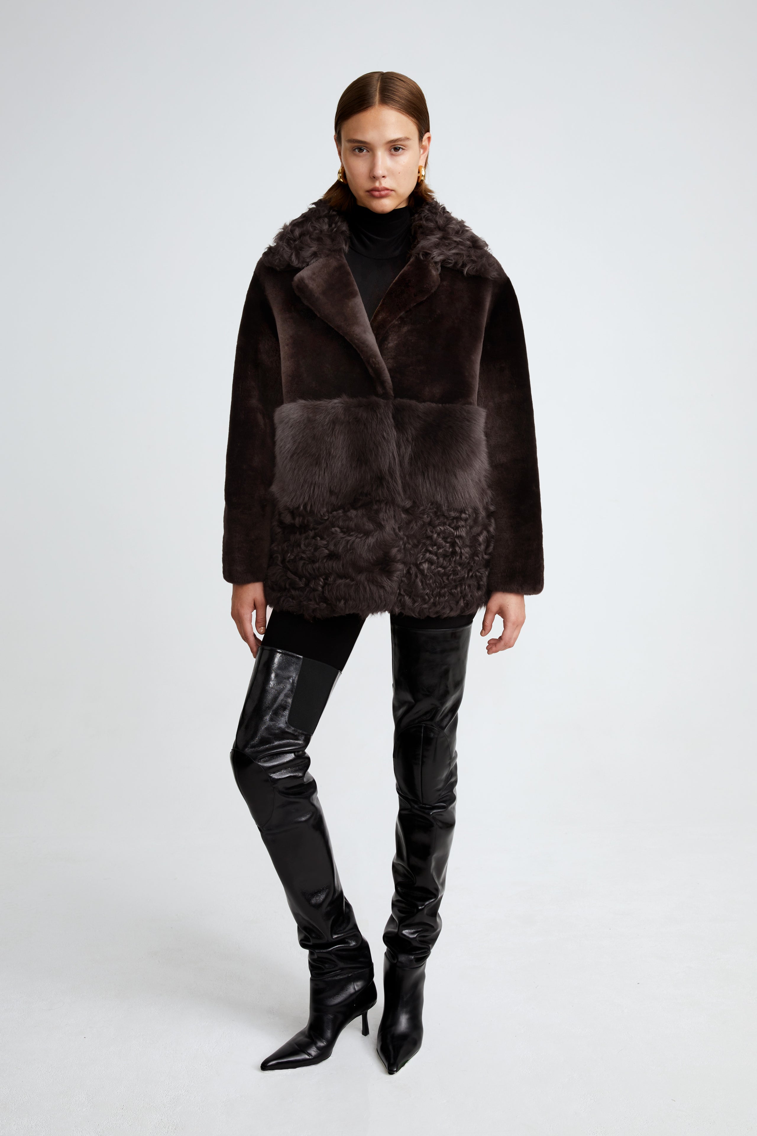 Model is wearing the Anouk Dark Chocolate Luxurious Shearling Coat Front