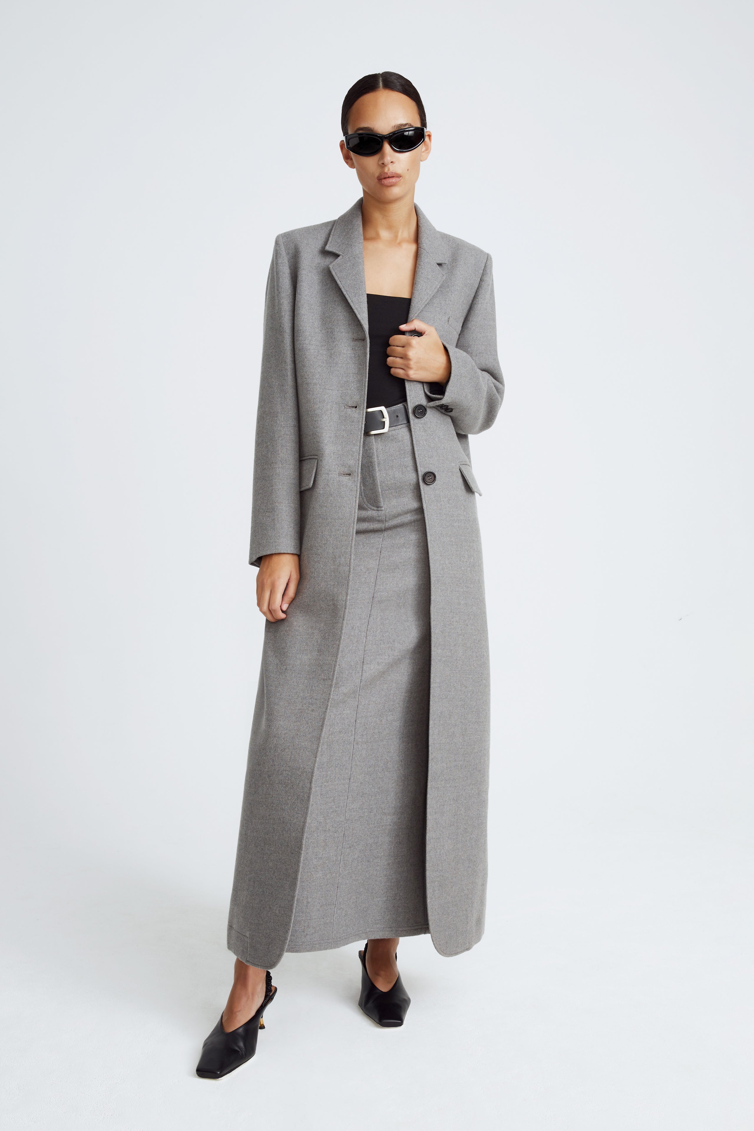 Model is wearing the Celine Light Grey Long Wool Coat Front