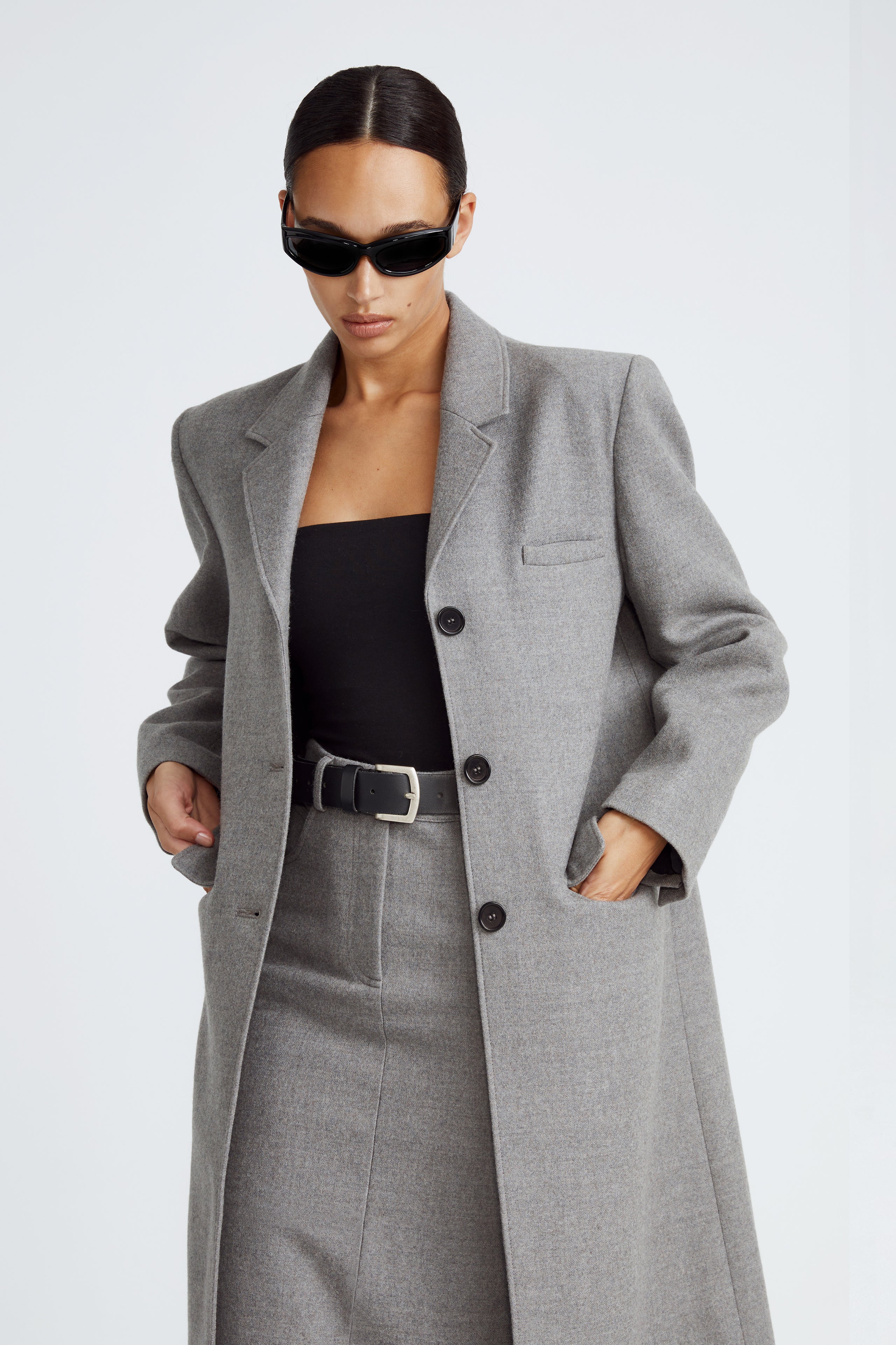 Model is wearing the Celine Light Grey Long Wool Coat Close Up