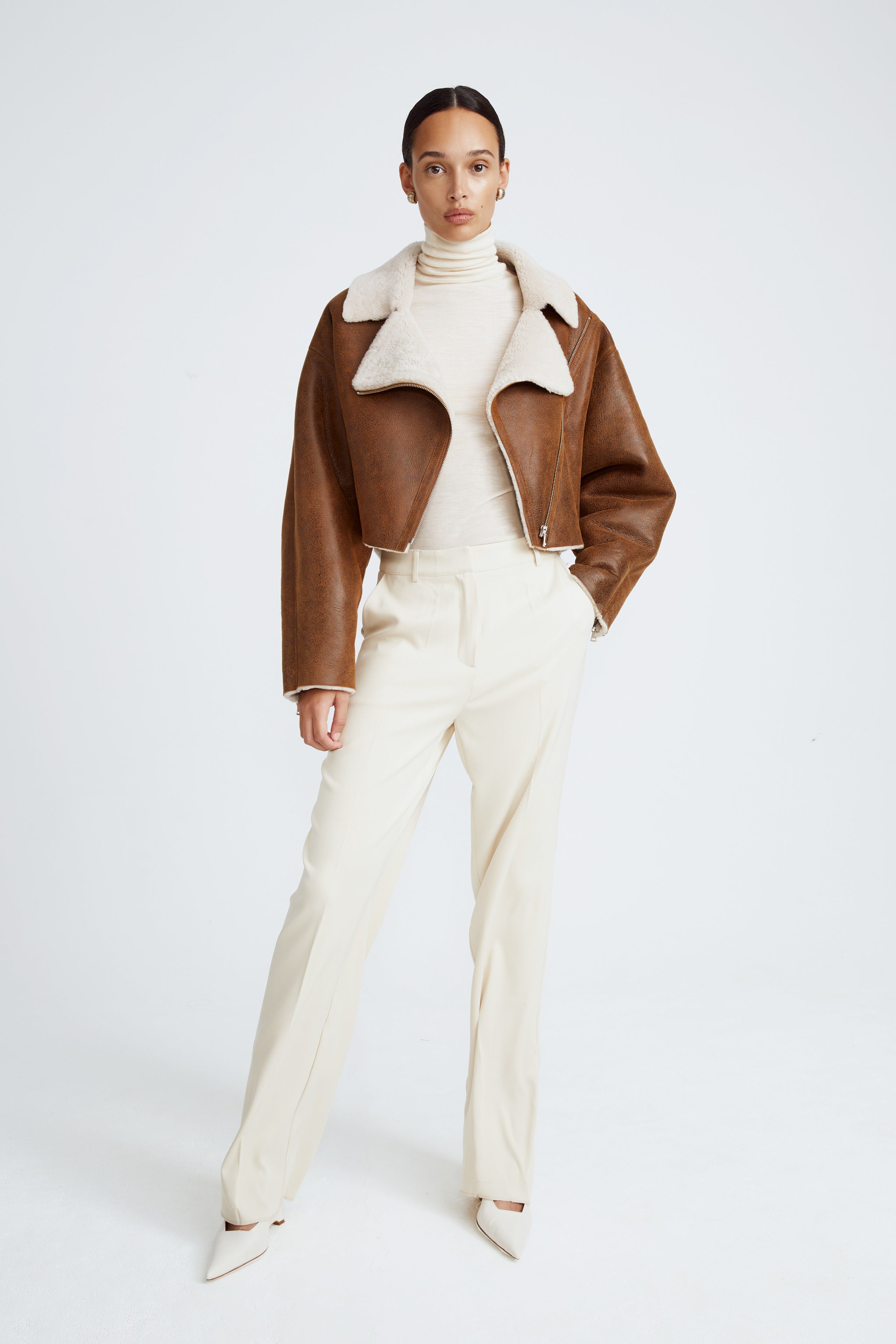 Model is wearing the Colorado Camel Ivory Relaxed Shearling Jacket Front