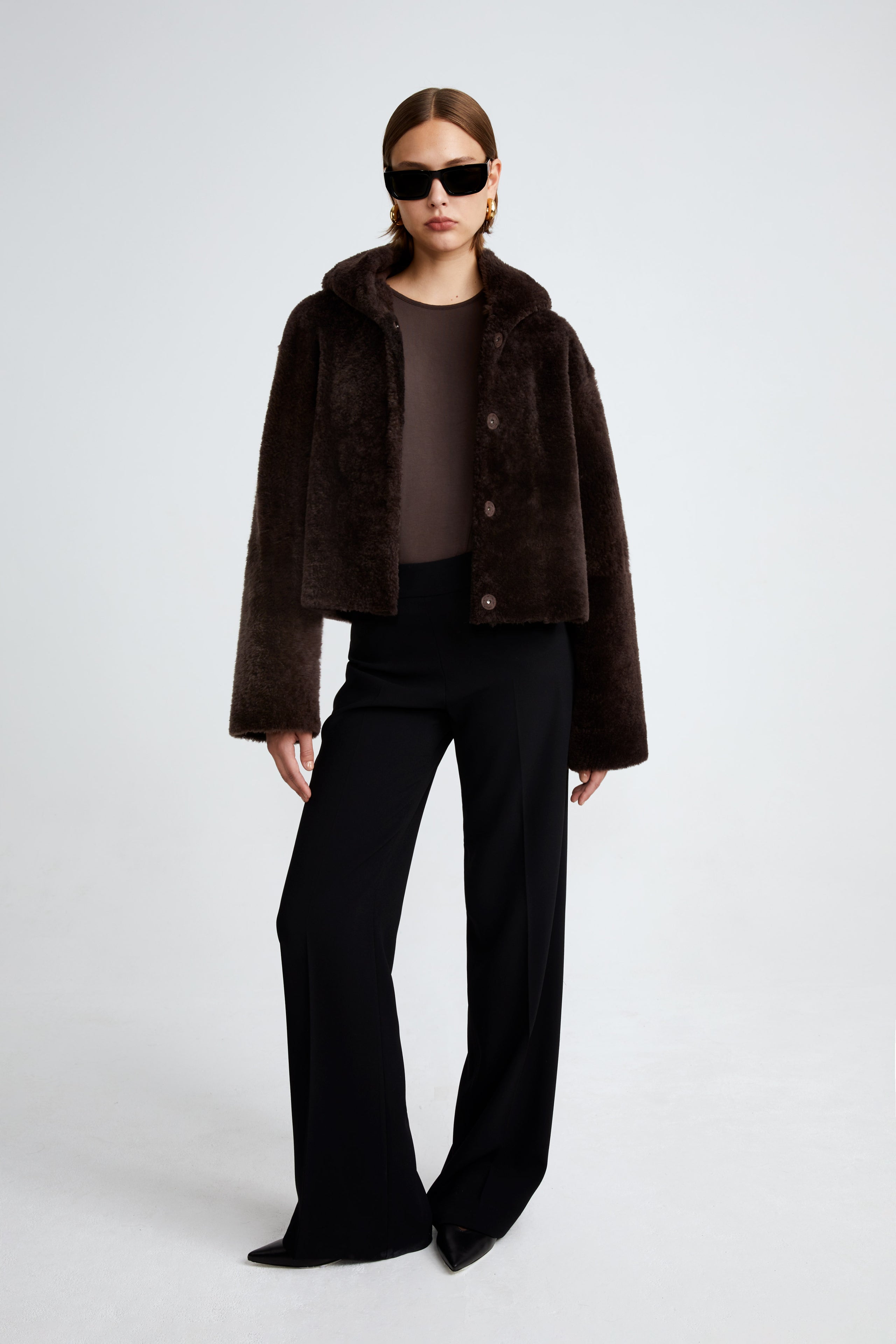 Model is wearing the Cooper Dark Chocolate Teddy Shearling Coat Front