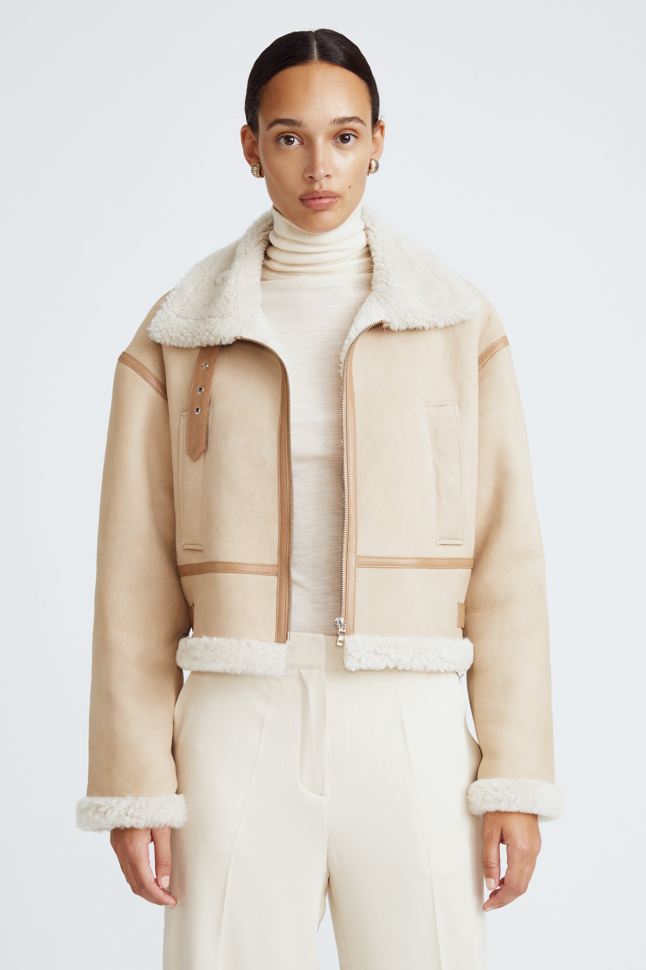 Model is wearing the Marco Cream Ivory Shearling Aviator Jacket Close Up