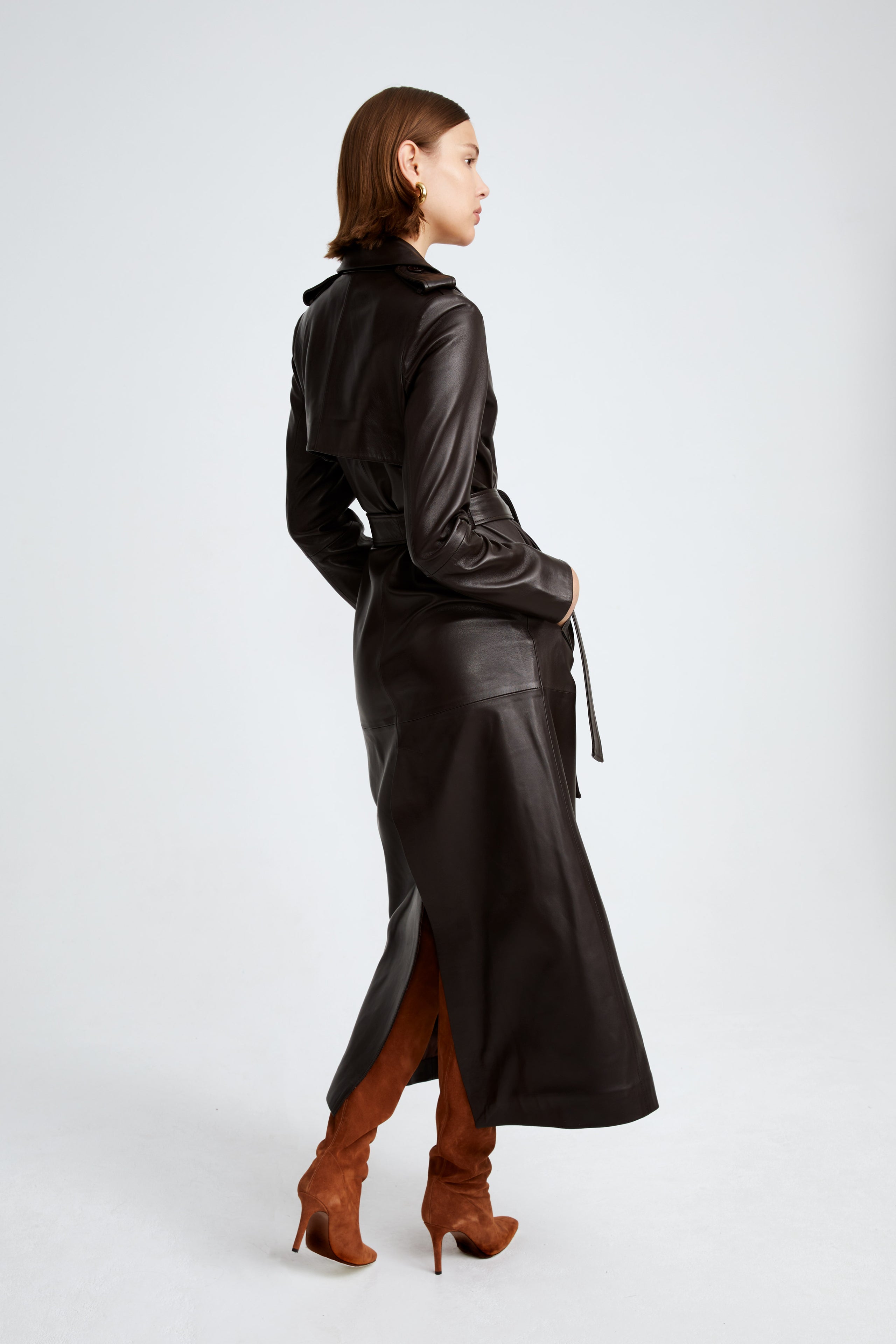 Model is wearing the Scarlett Umber Belted Leather Coat Back