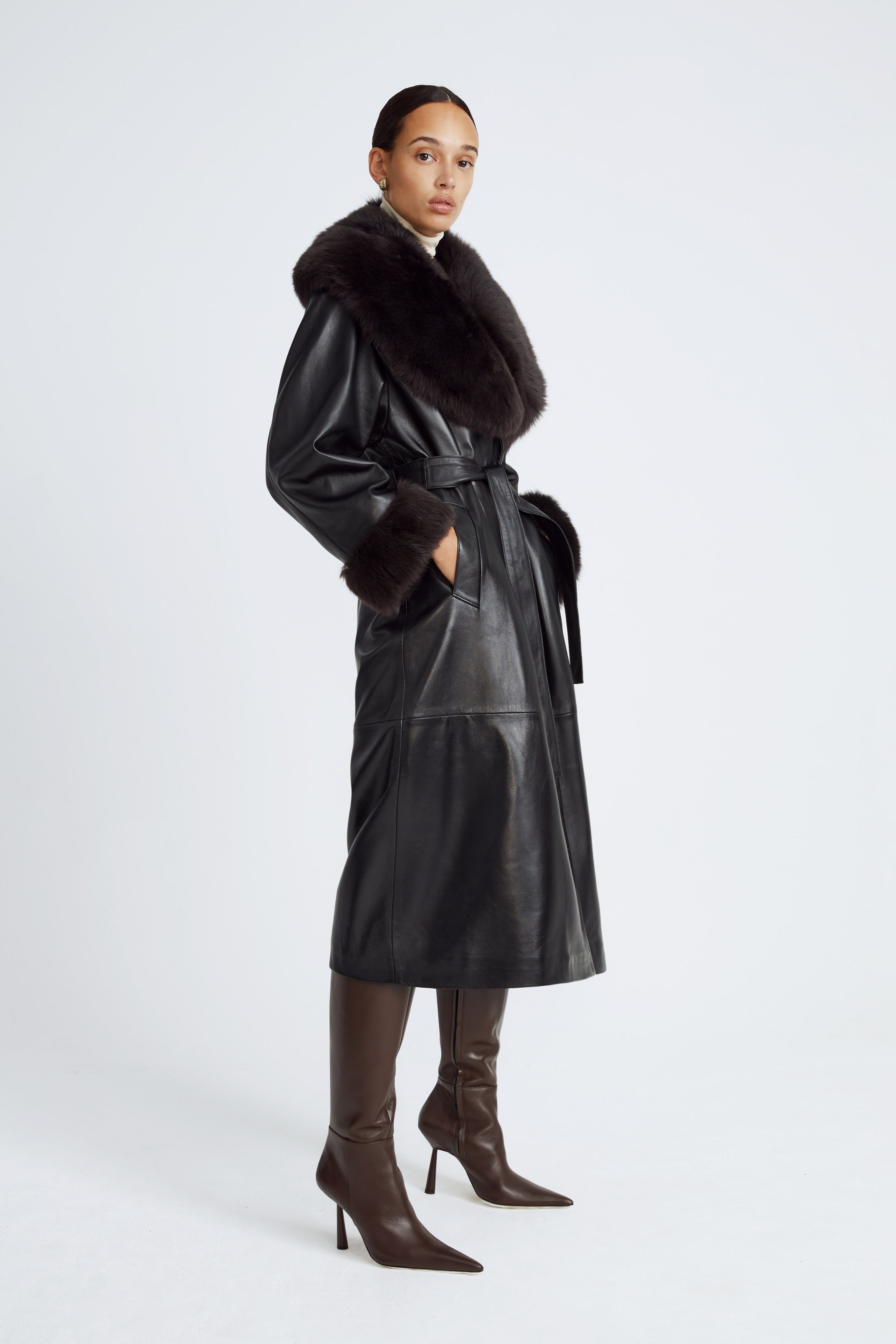 Model is wearing the Freja Black Espresso Luxurious Leather Trench Side
