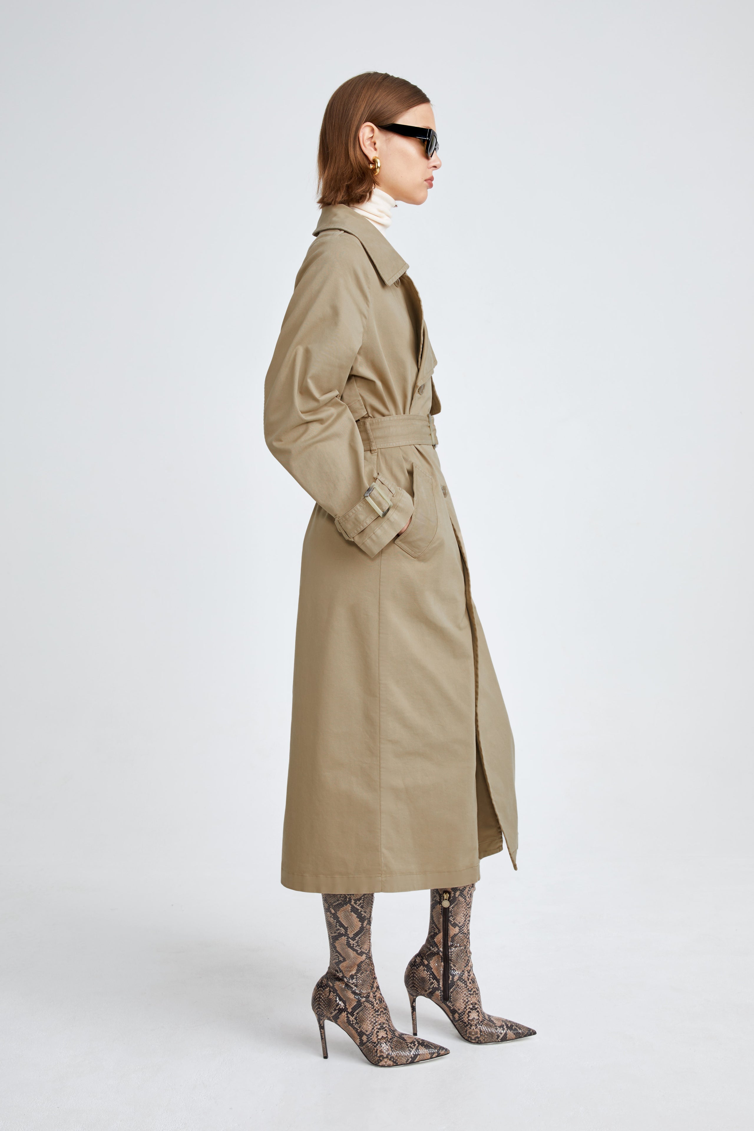 Model is wearing the Harriet Canvas Khaki Long Fabric Trench Side