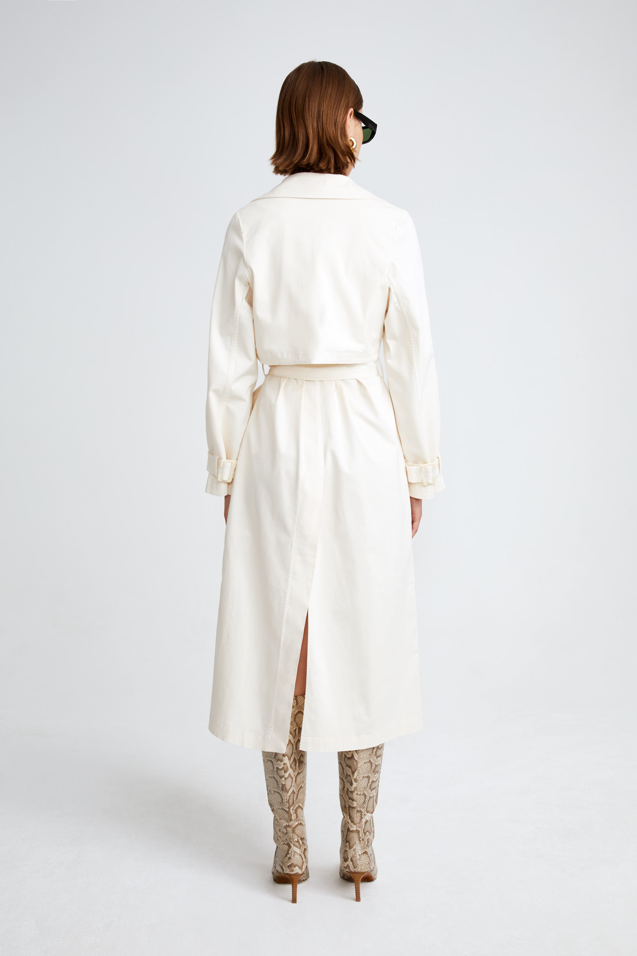 Model is wearing the Harriet Canvas Cream Long Fabric Trench Back