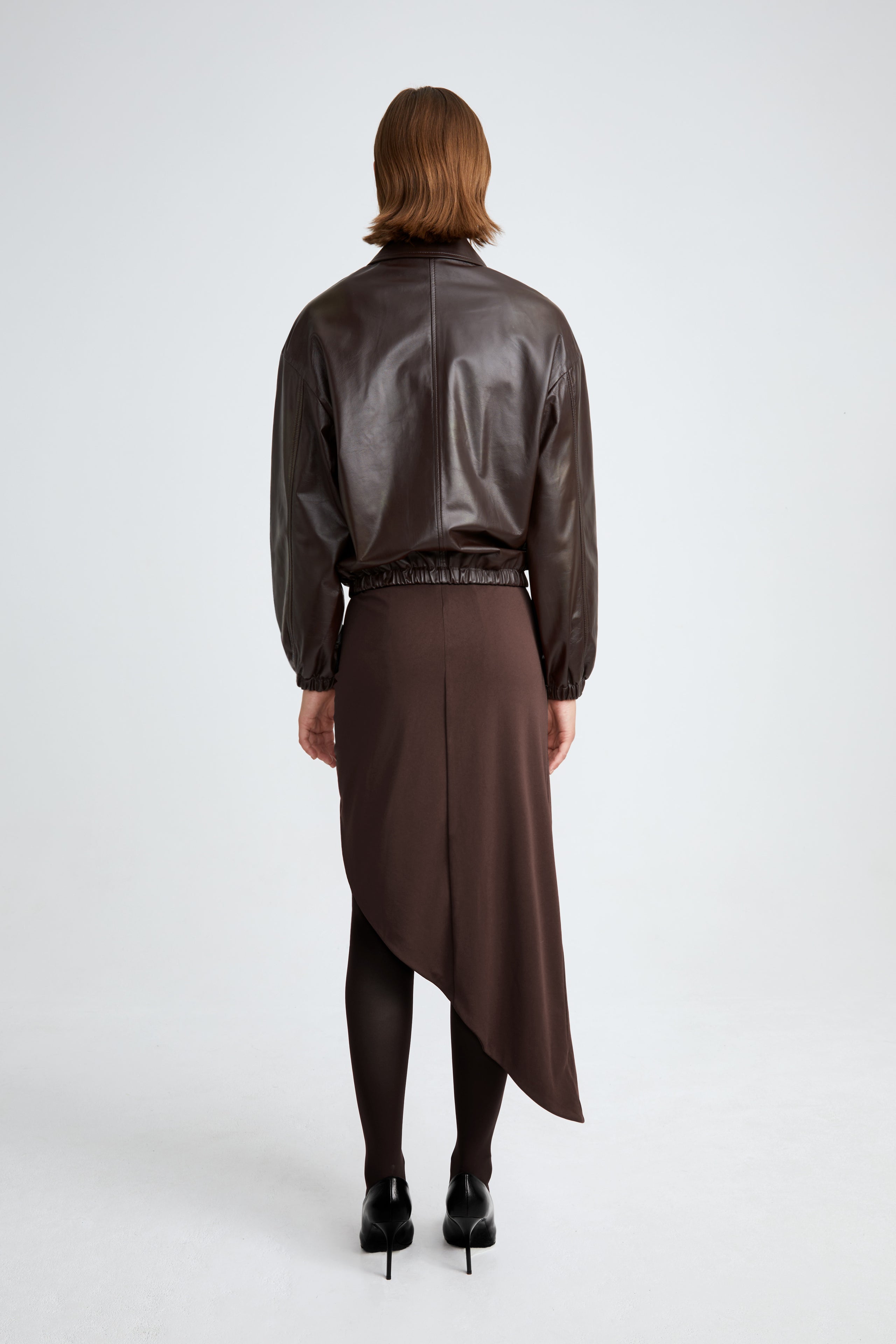 Model is wearing the Luna Dark Chocolate Leather Bomber Jacket Back