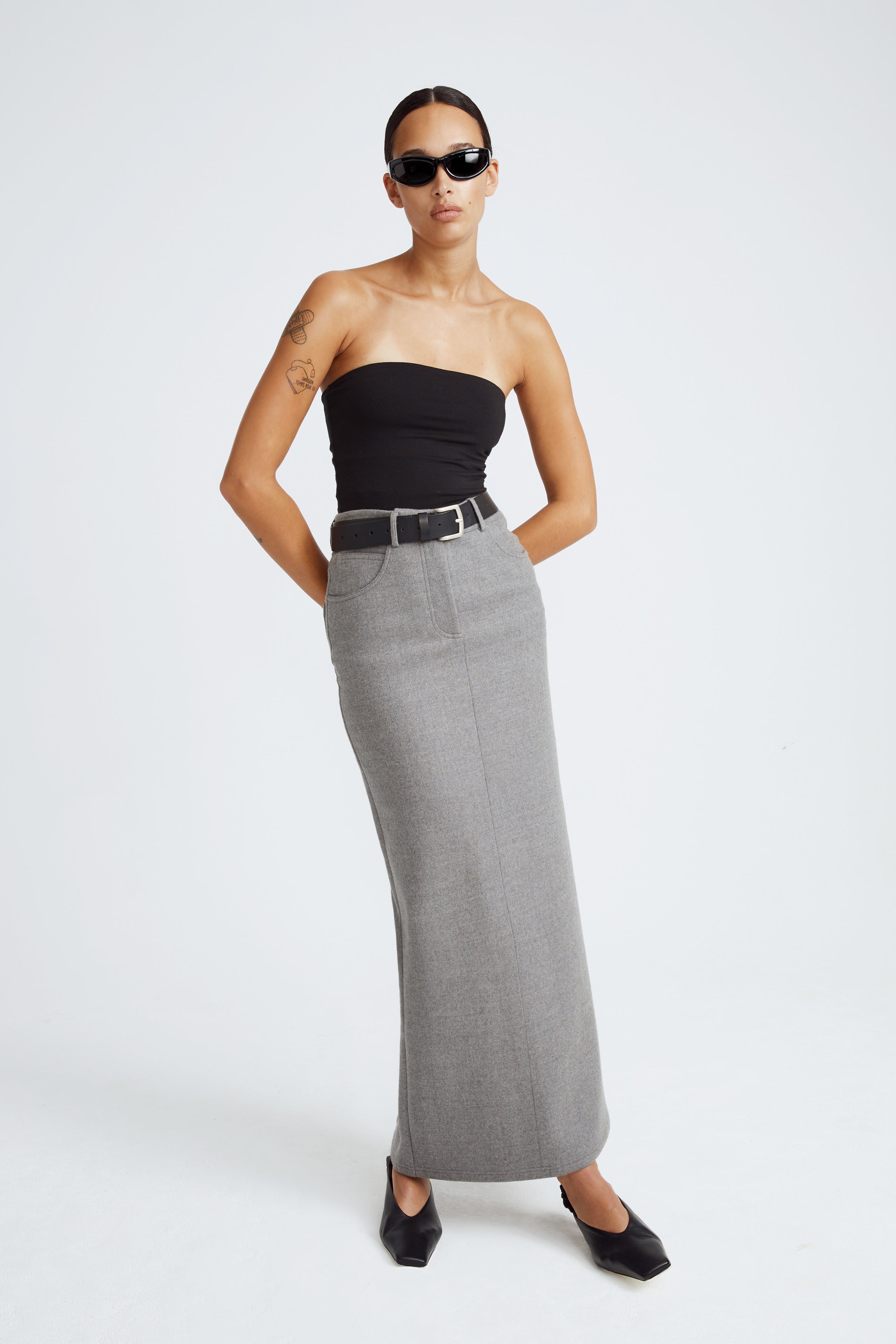 Model is wearing the Mae Light Grey Long Wool Skirt Front