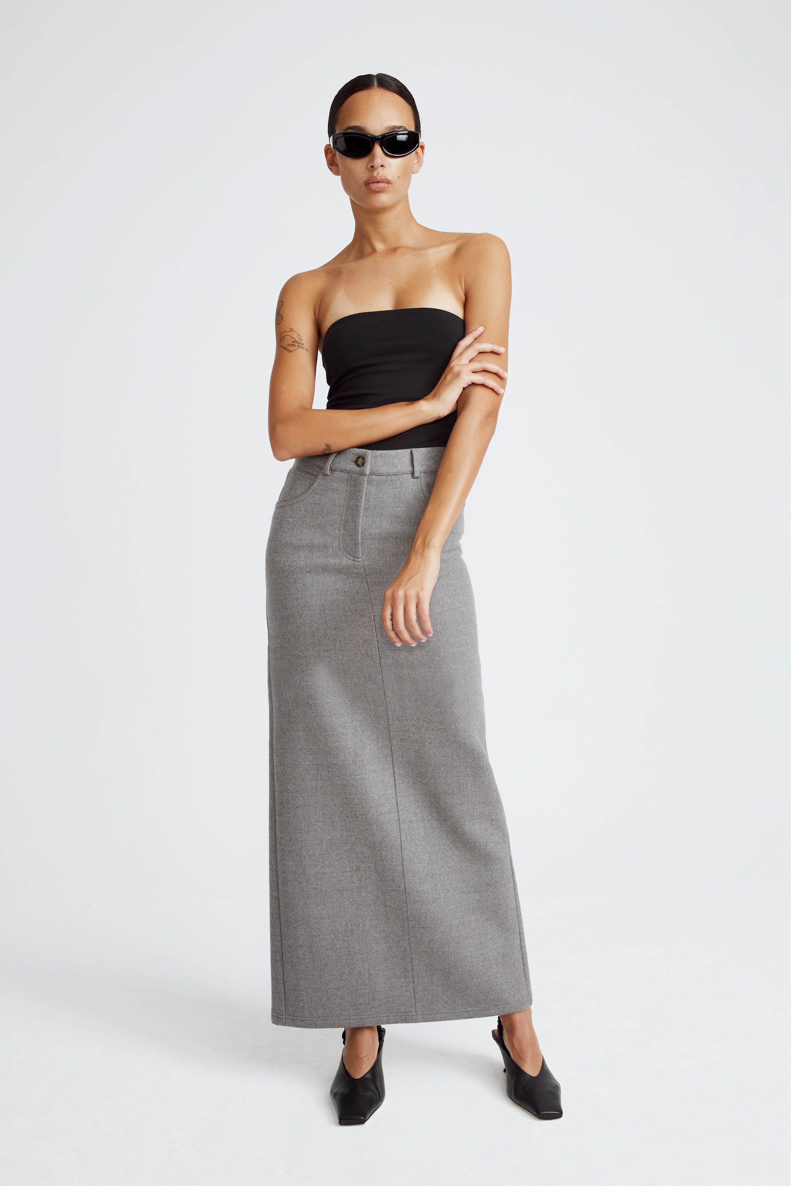 Model is wearing the Mae Light Grey Long Wool Skirt Front
