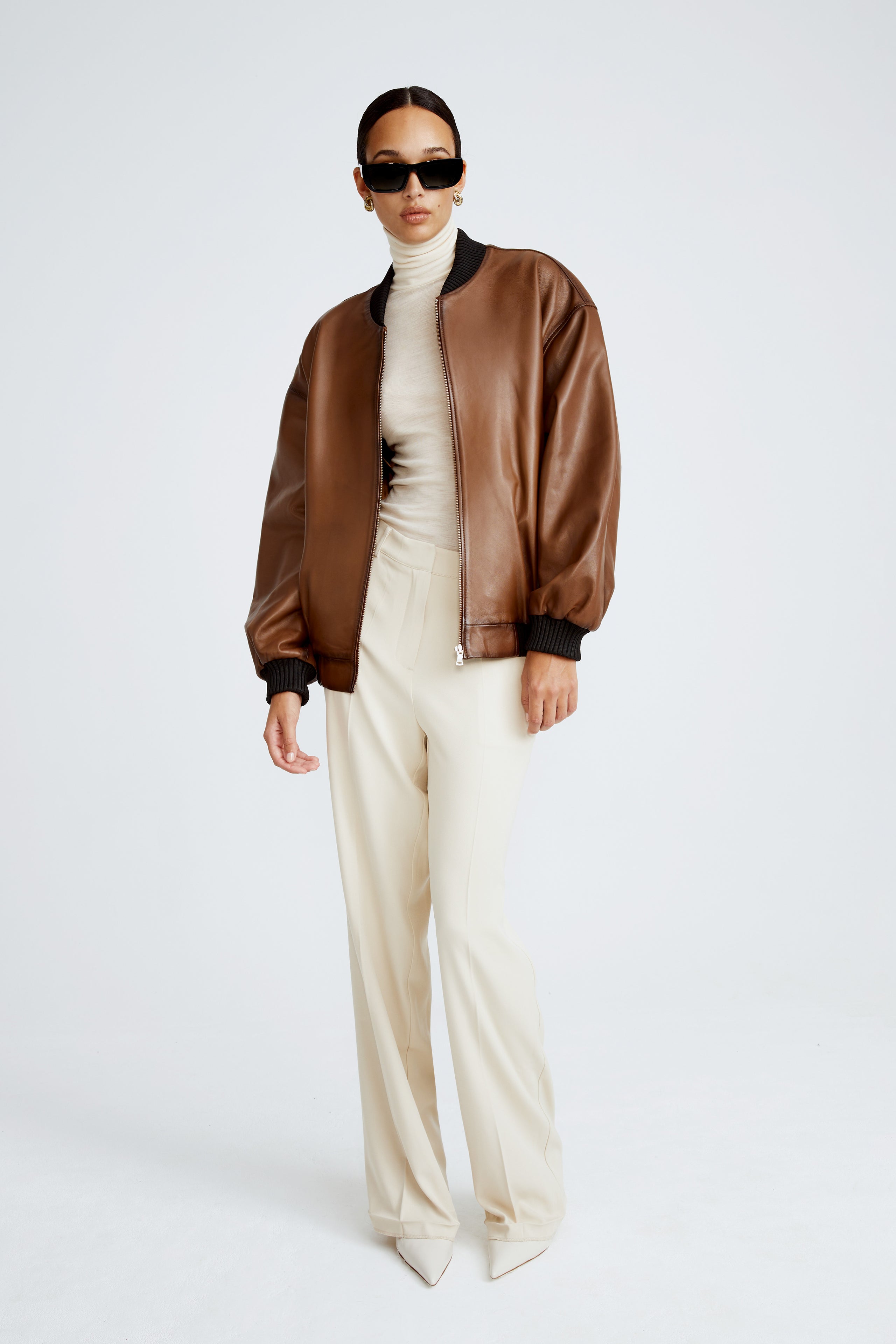 Model is wearing the Marly Brown Leather Bomber Jacket Front