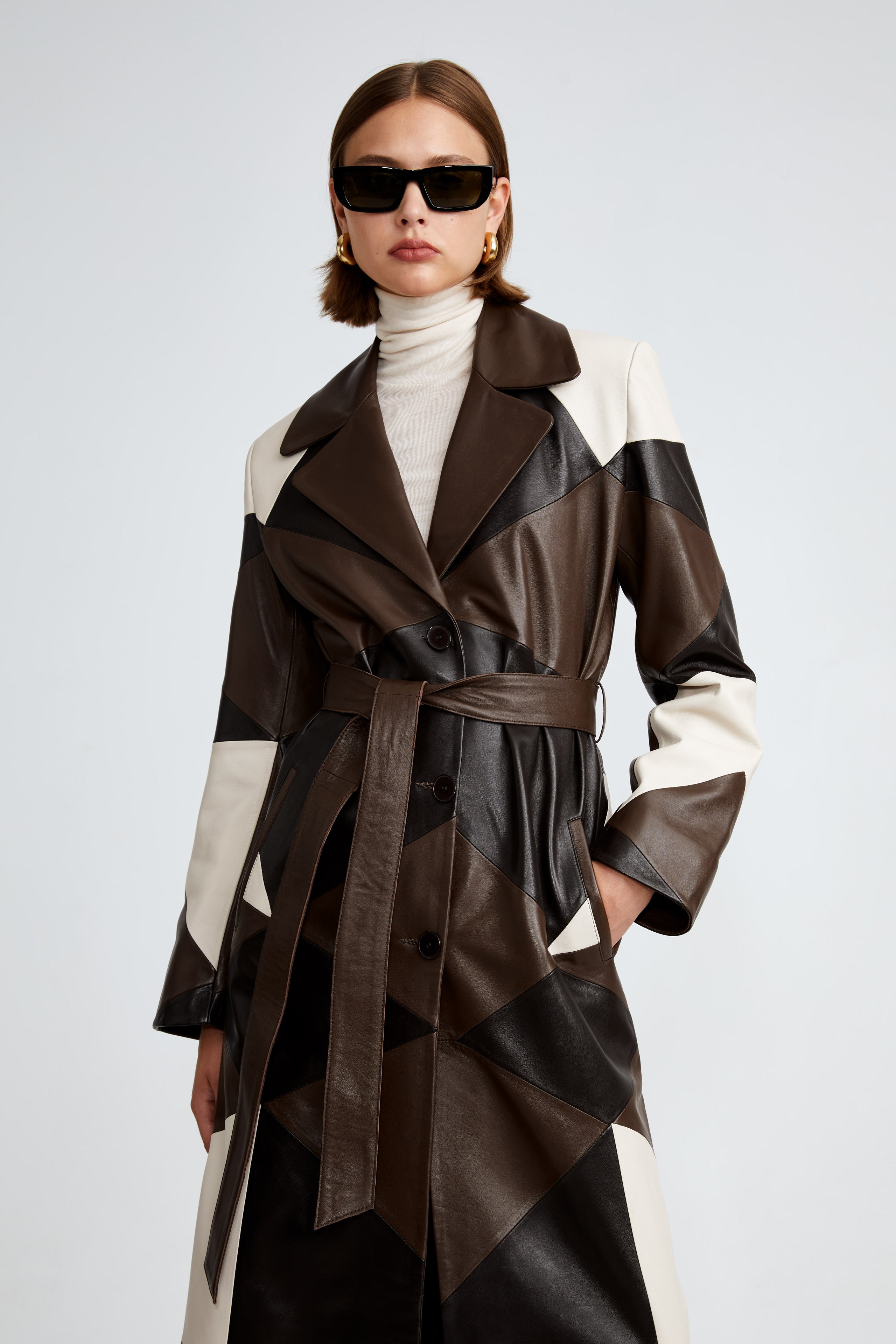 Model is wearing the Sonja Cocoa Vanilla Brown Patchwork Leather Trench Close Up