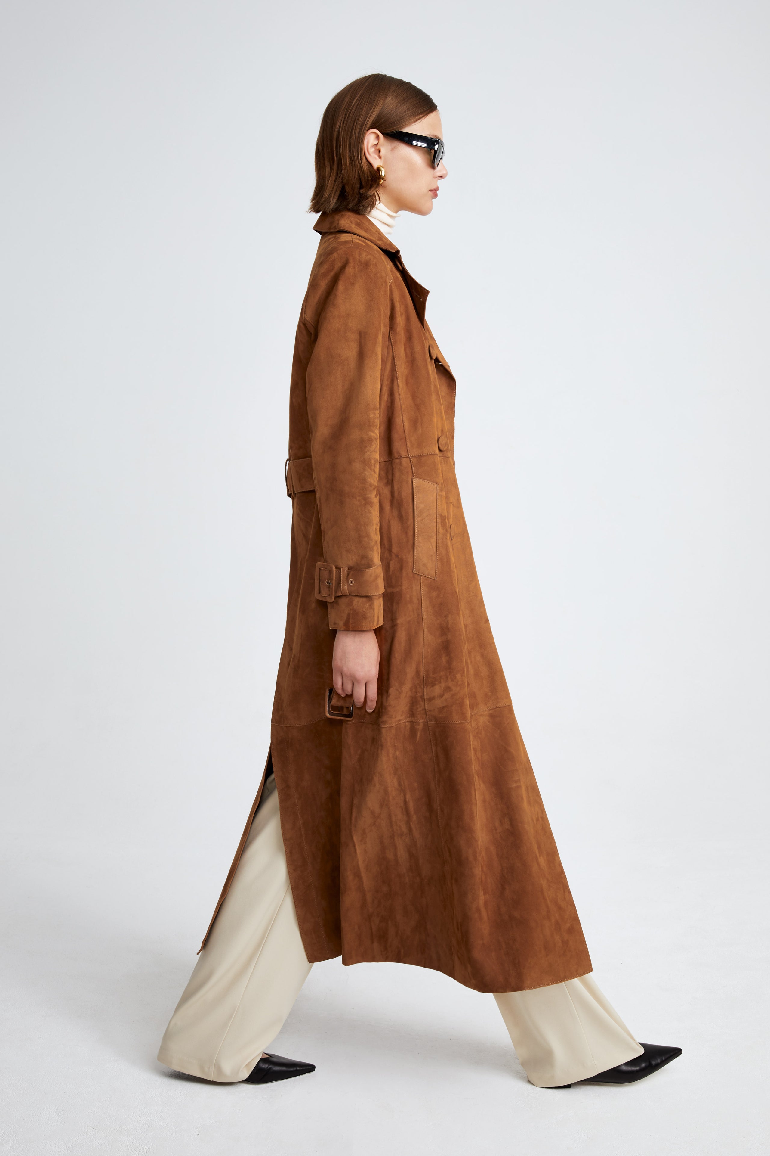 Model is wearing the Tate Caramel Everyday Suede Trench Coat Side