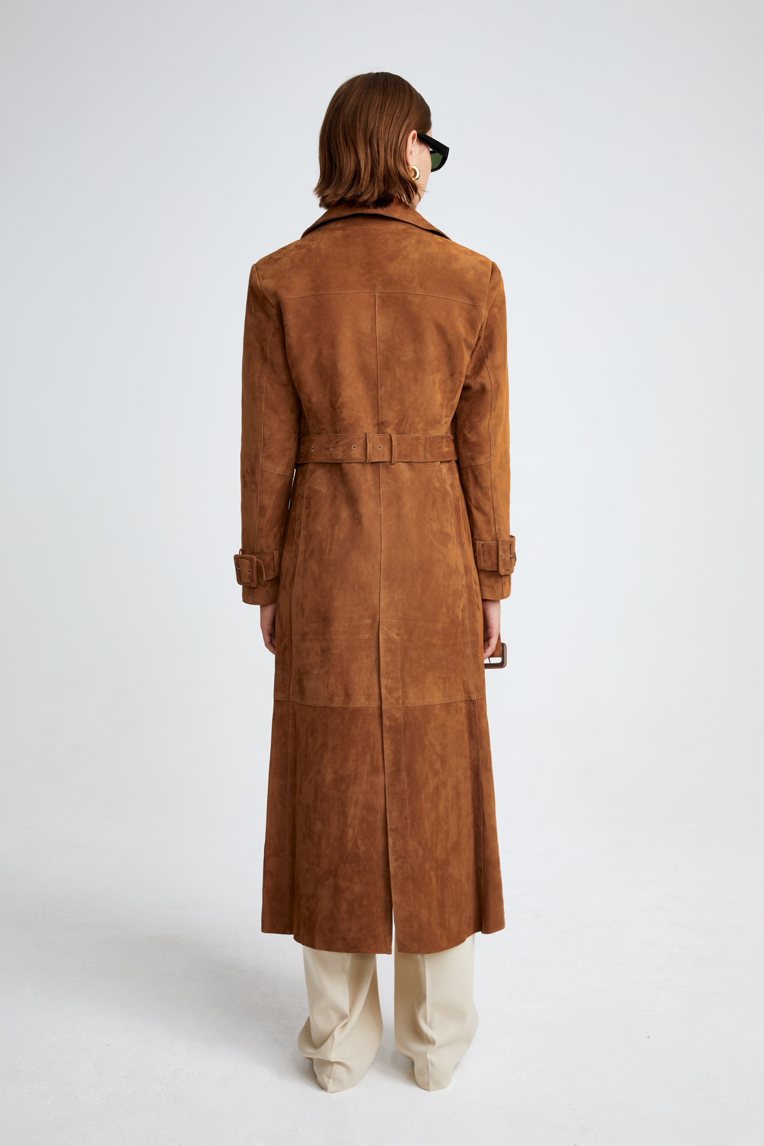 Model is wearing the Tate Caramel Everyday Suede Trench Coat Back