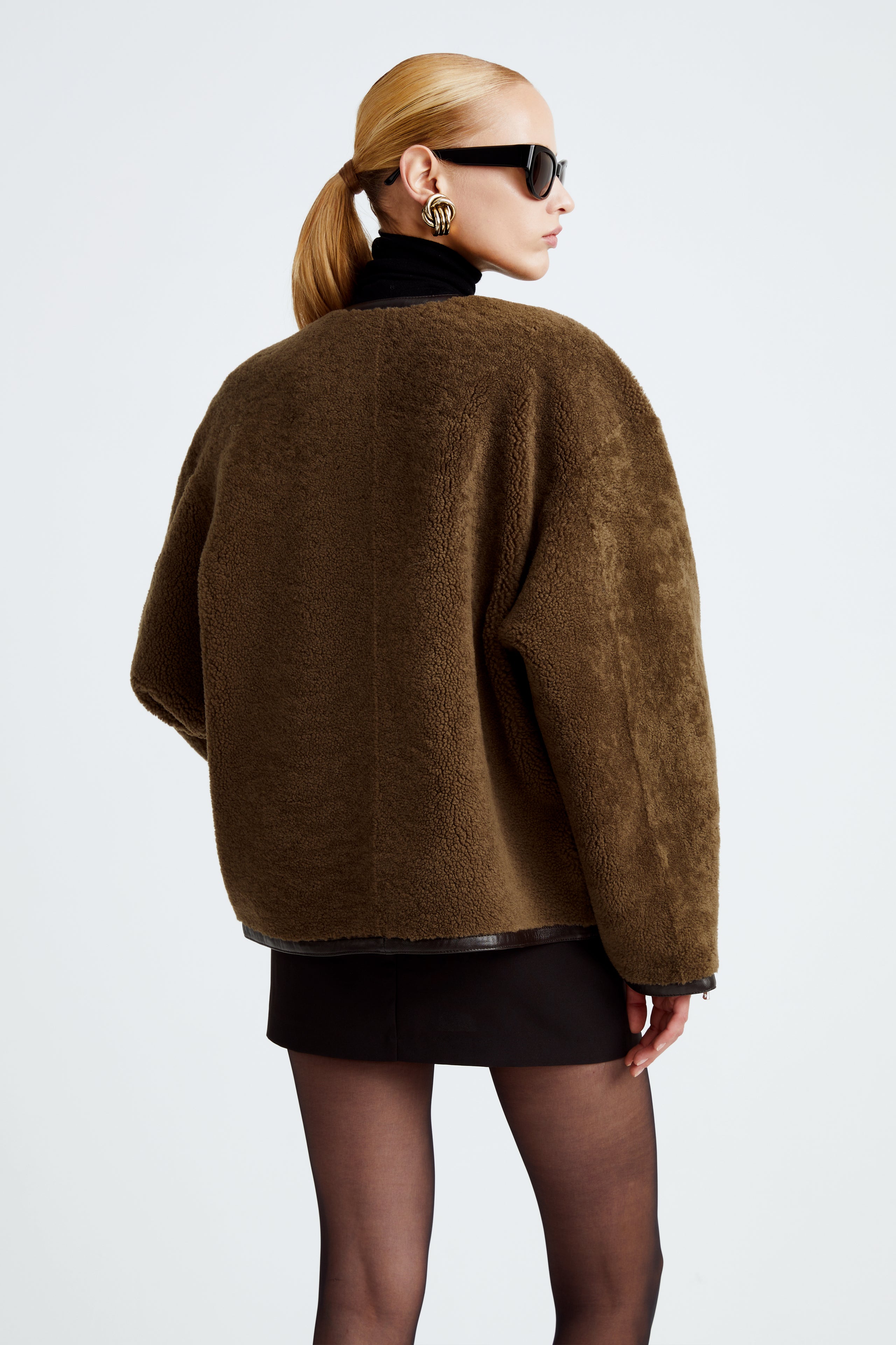 Model is wearing the Ronin Zeytoun Brown Teddy Shearling Jacket Back